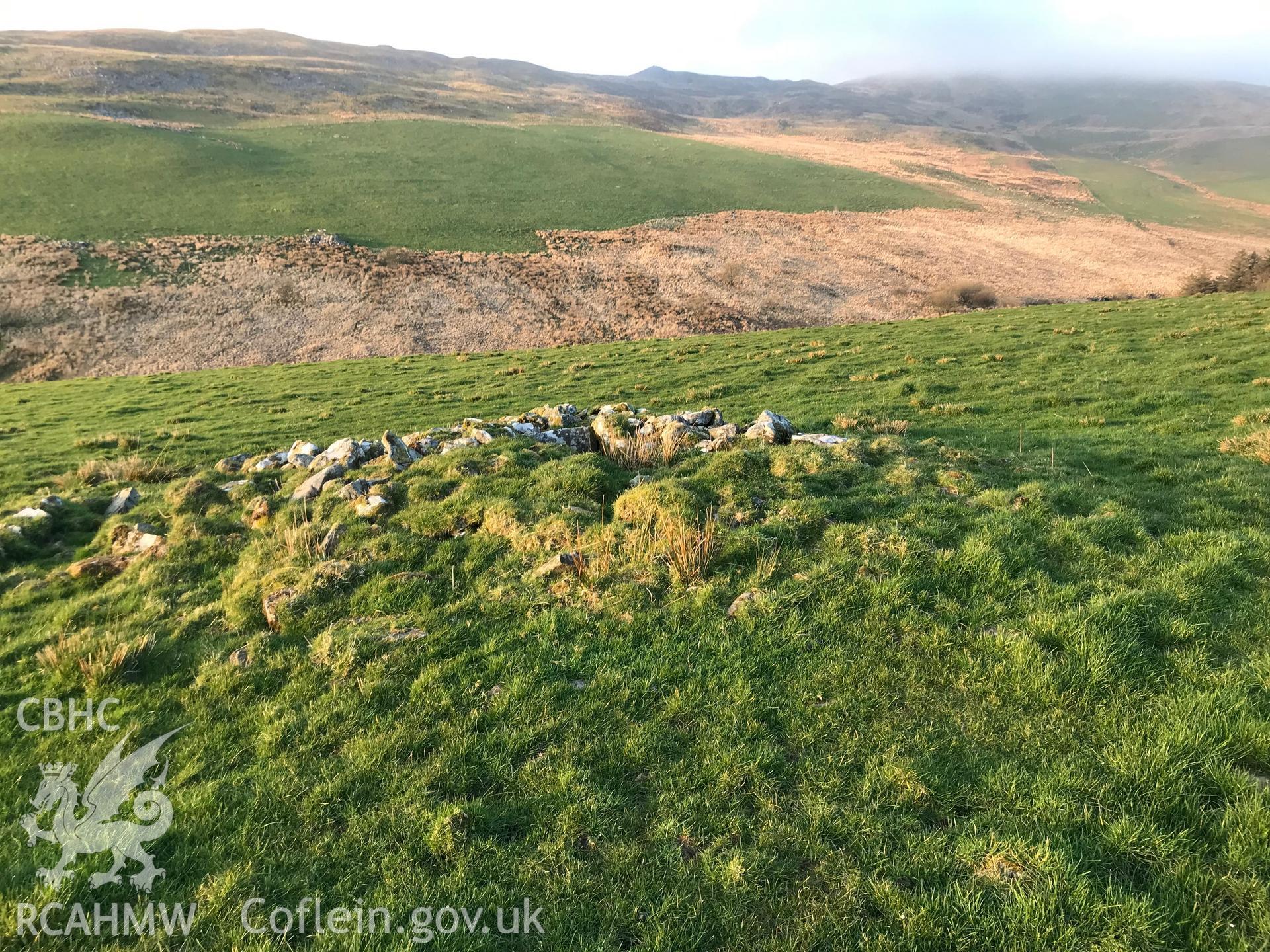 Colour photograph of western cairn at Cae'r Arglwydd on Moel y Garn, north east of Talybont, taken by Paul R. Davis on 26th February 2019.