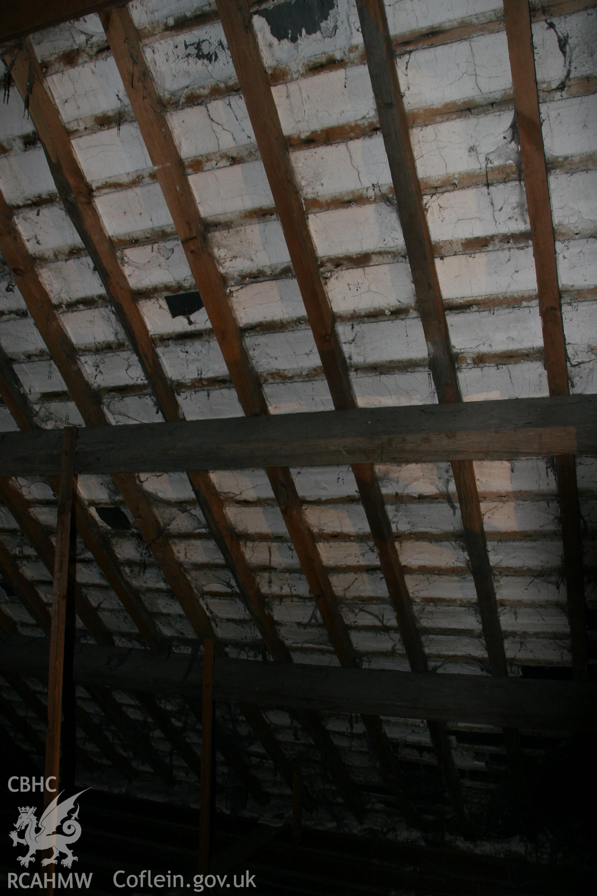 Photograph showing detailed interior view of wooden beams and roof of the former Llawrybettws Welsh Calvinistic Methodist chapel, Glanyrafon, Corwen. Produced by Tim Allen on 27th February 2019 to meet a condition attached to planning application.