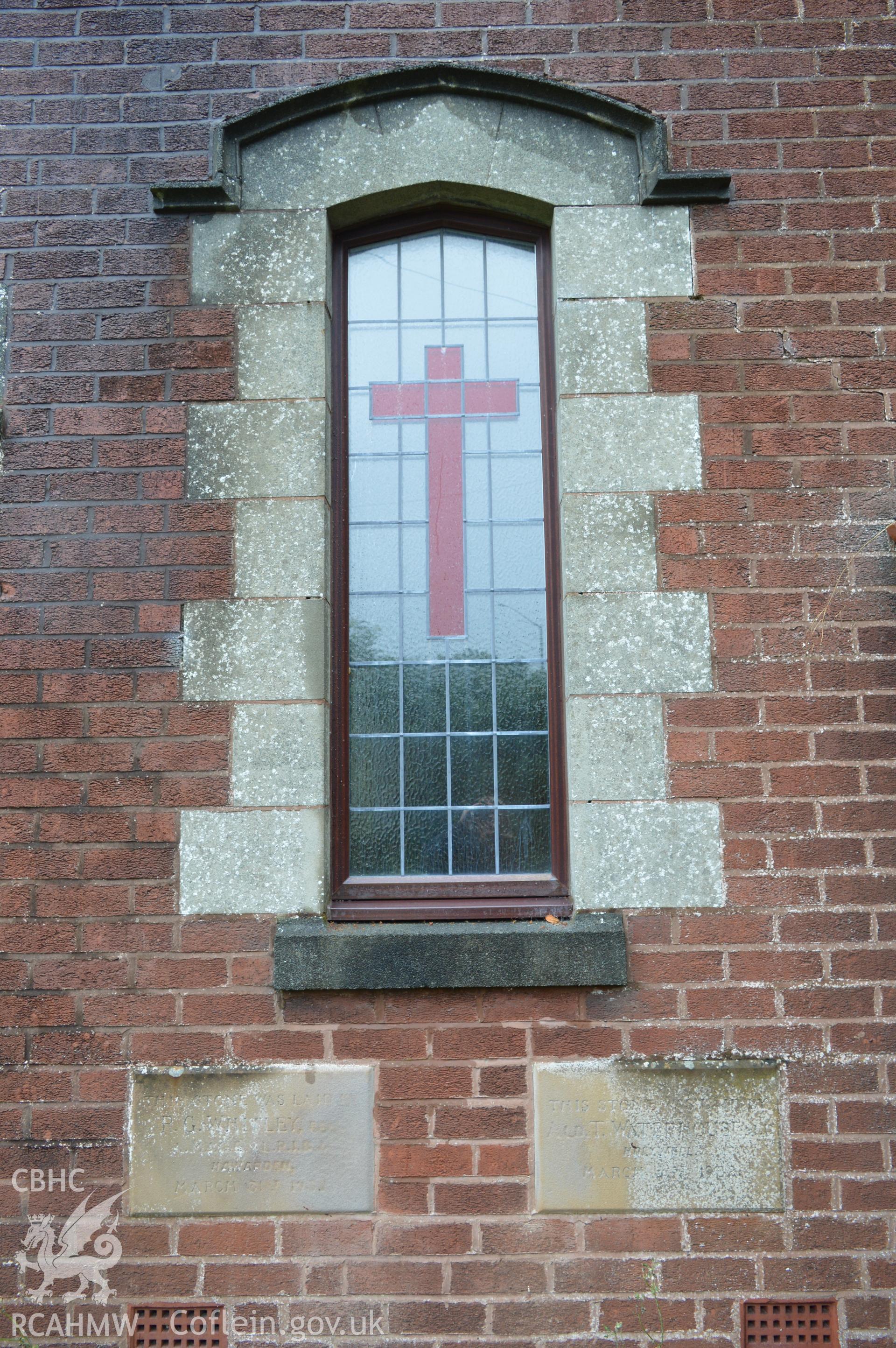 External view showing memorial stone on west elevation of the Church. Digital colour photograph taken during CPAT Project 2396 at the United Reformed Church in Northop. Prepared by Clwyd Powys Archaeological Trust, 2018-2019.