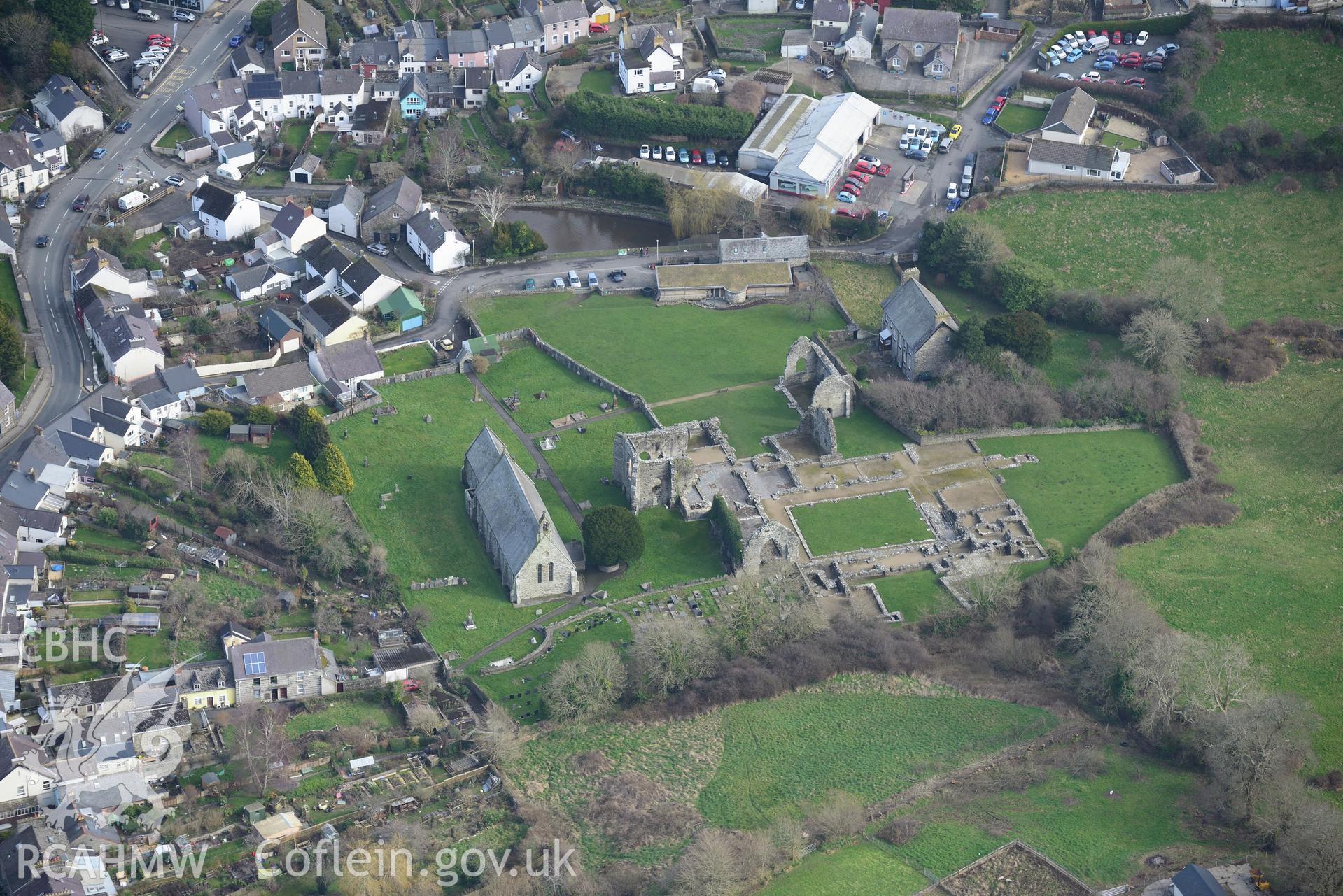 St. Dogmael's Abbey; St. Thomas the Apostle Church; The Vicarage and the Vicarage Stables and Coach House, St. Dogmaels. Oblique aerial photograph taken during the Royal Commission's programme of archaeological aerial reconnaissance by Toby Driver on 13th March 2015.