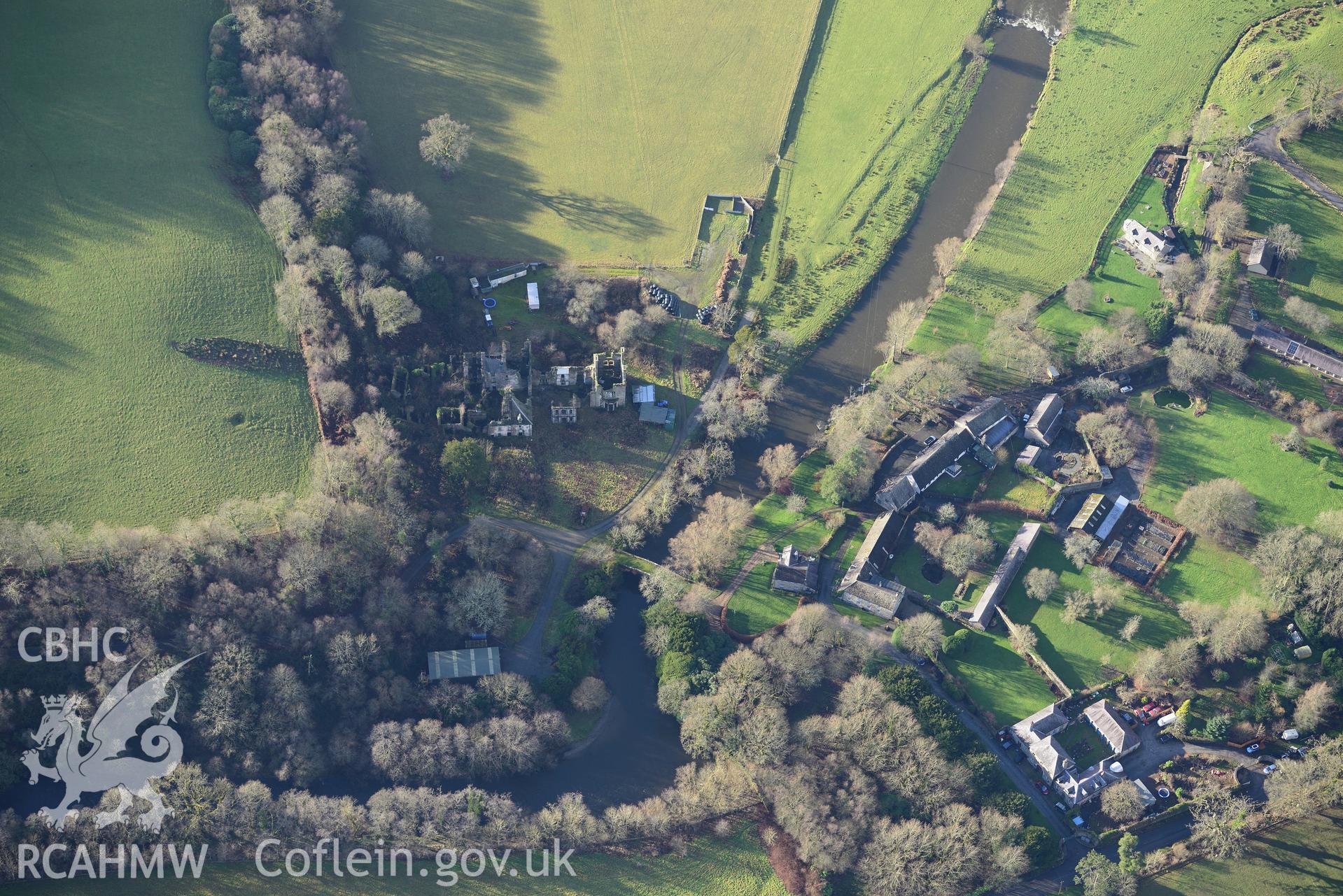 Edwinsford House and Garden, Home Farm, stable yard, coach house, dairy, outbuildings and Cothi Bridge. Oblique aerial photograph taken during the Royal Commission's programme of archaeological aerial reconnaissance by Toby Driver on 6th January 2015.