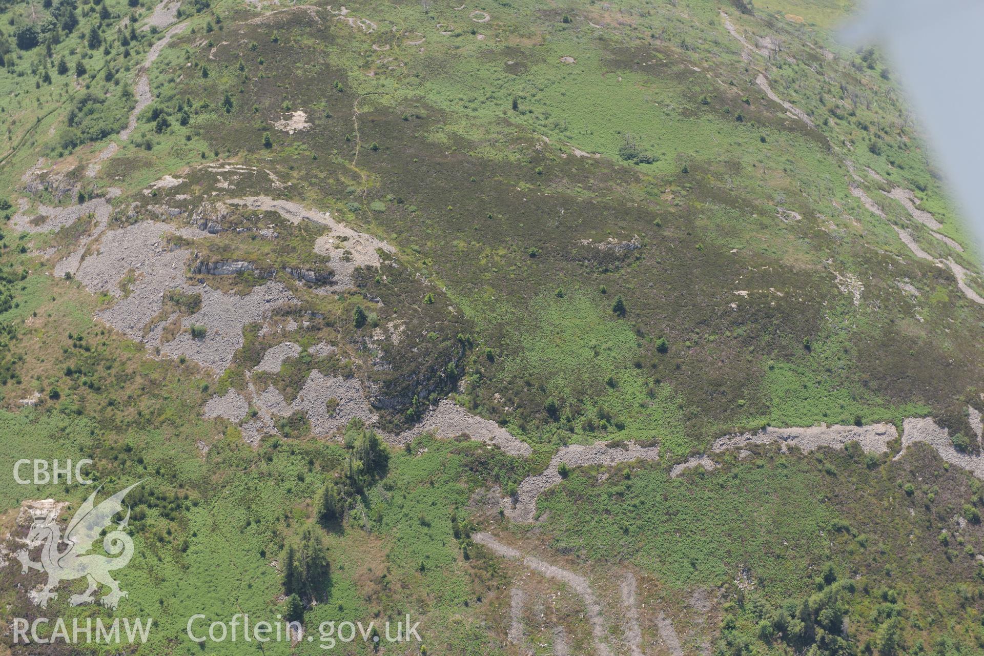 Garn Boduan hillfort, Nefyn, on the Lleyn Peninsula. Oblique aerial photograph taken during the Royal Commission?s programme of archaeological aerial reconnaissance by Toby Driver on 12th July 2013.