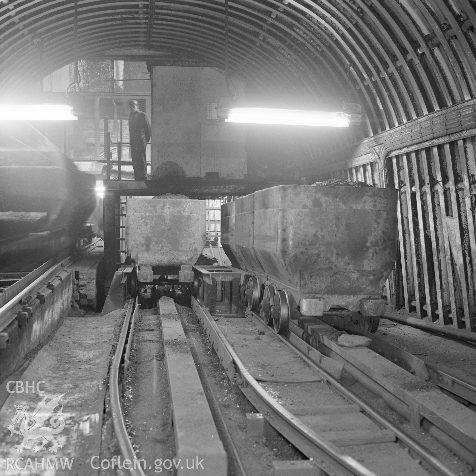 Digital copy of an acetate negative showing coal trams at Taff Colliery, from the John Cornwell Collection.