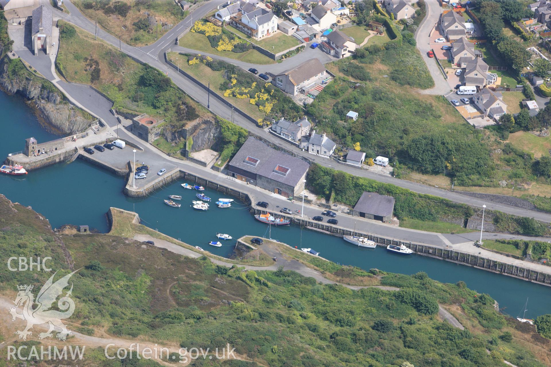 Amlwch harbour, Anglesey. Oblique aerial photograph taken during the Royal Commission?s programme of archaeological aerial reconnaissance by Toby Driver on 12th July 2013.