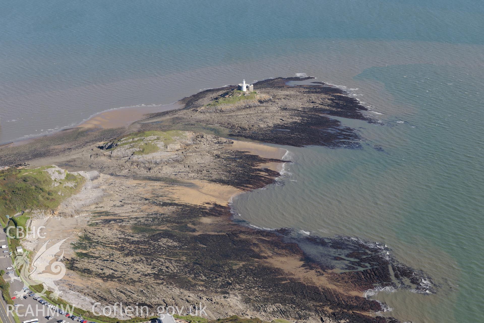 Mumbles fort and Mumbles lighthouse at the south western edge of Swansea Bay. Oblique aerial photograph taken during the Royal Commission's programme of archaeological aerial reconnaissance by Toby Driver on 30th September 2015.
