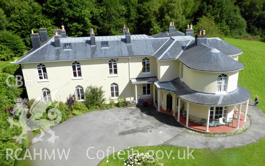 Colour photo of Dol-llys, Llanidloes, showing an aerial view of the south side of the house (after repainting) and lawn taken by Mal Shears during August 2017.