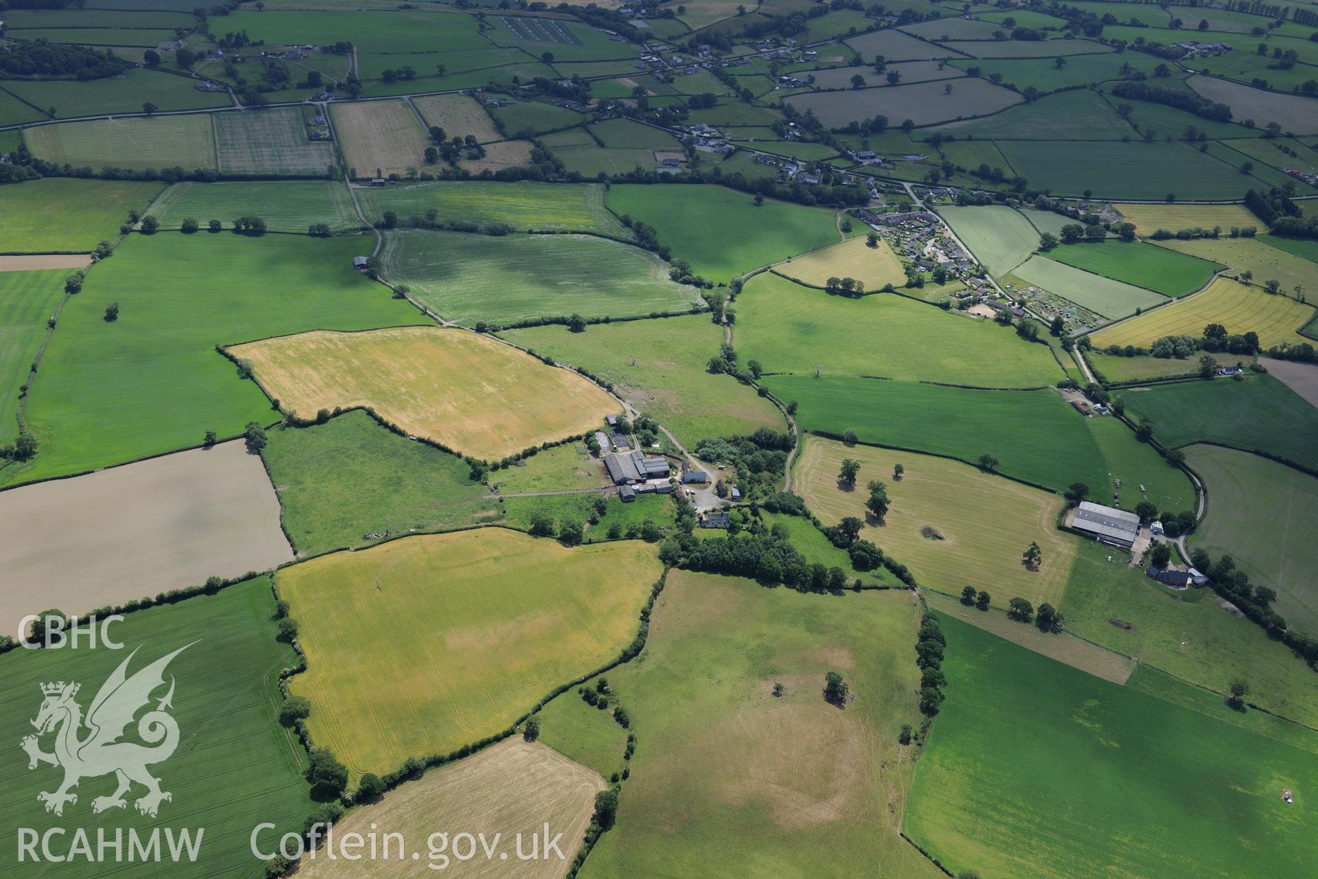 Cropmark enclosure at Pen-y-Lan, between Welshpool and Montgomery. Oblique aerial photograph taken during the Royal Commission's programme of archaeological aerial reconnaissance by Toby Driver on 30th June 2015.