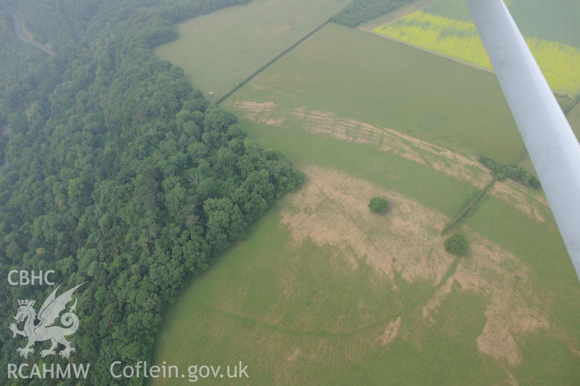 Royal Commission aerial photography of Wyndcliff Roman villa and hillfort taken during drought conditions on 22nd July 2013.