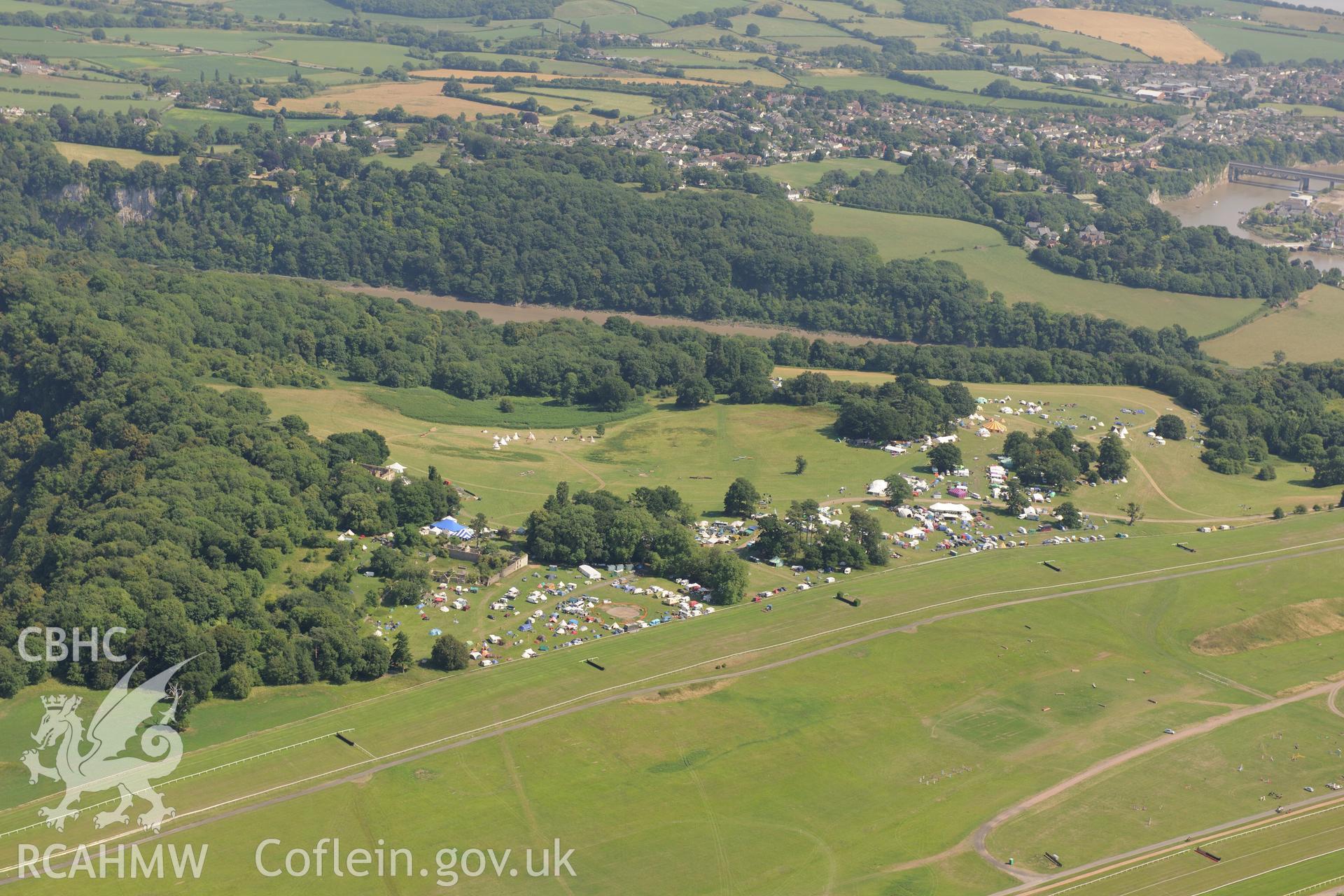 Piercefield Park and Chepstow Racecourse with the river Wye beyond. Oblique aerial photograph taken during the Royal Commission?s programme of archaeological aerial reconnaissance by Toby Driver on 1st August 2013.