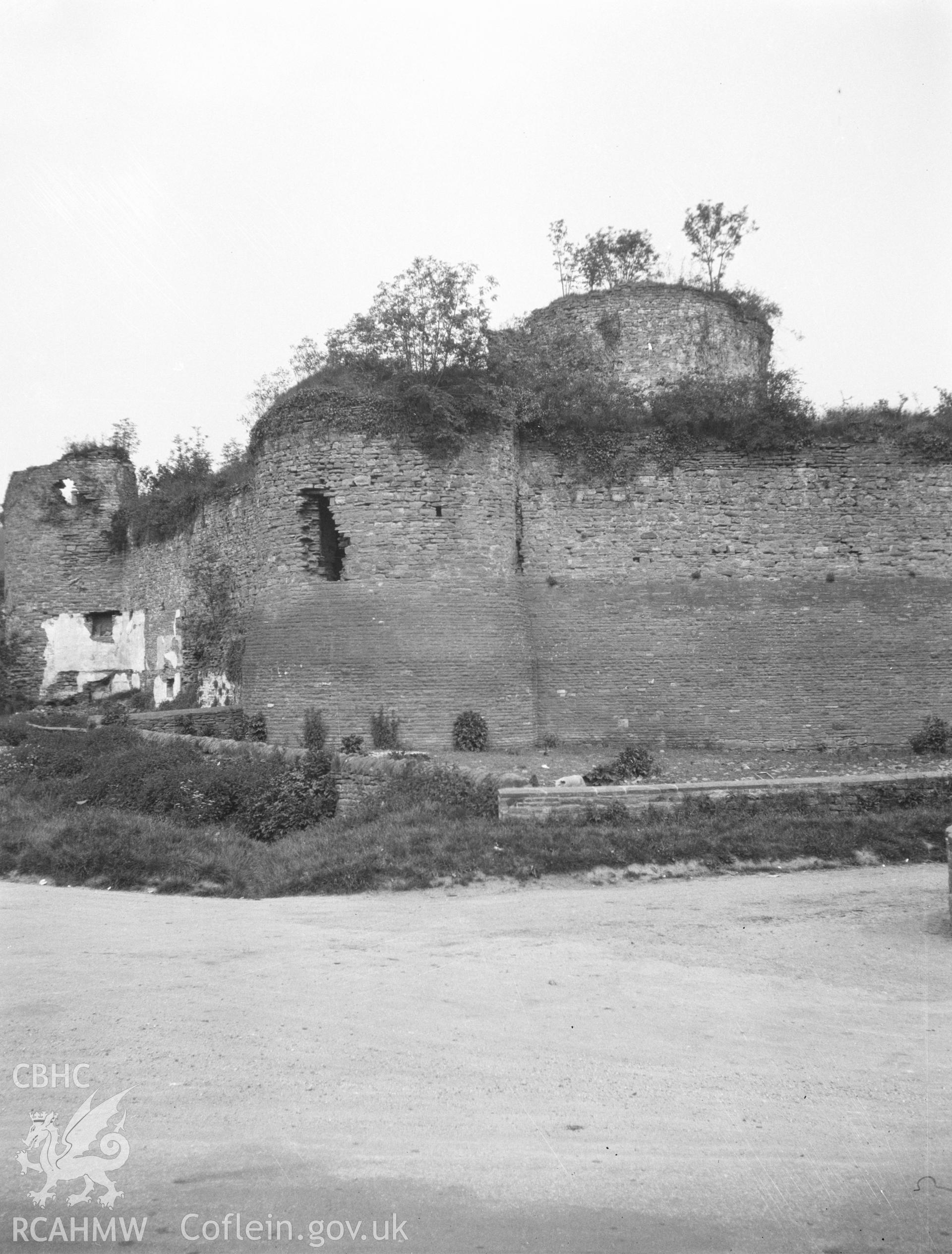 Digital copy of a nitrate negative showing exterior view of top of circular keep behind curtain wall, Skenfrith Castle, taken circa 1934. From the National Building Record Postcard Collection.