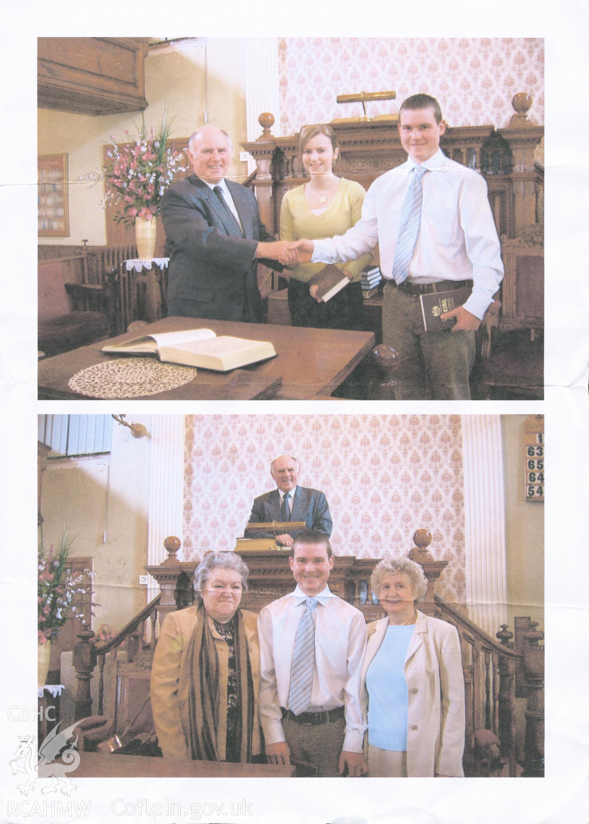 Colour photograph of Kerri Shore and Owain Davies being presented with a bible by Minister Gareth Edwards during ceremony to mark becoming full members of the chapel c.2011. Donated as part of the Digital Dissent Project.