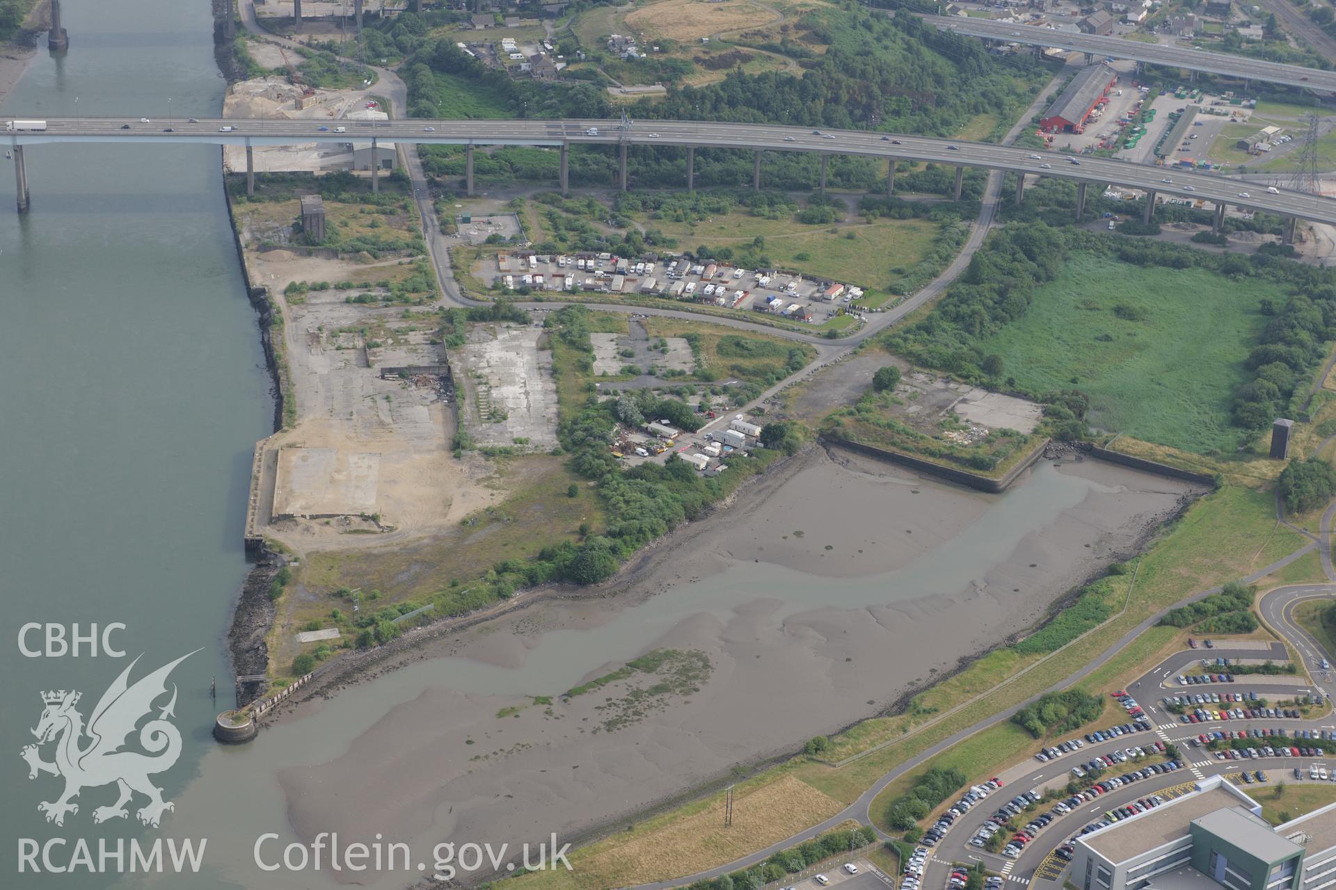 Royal Commission aerial photography of Briton Ferry Dock recorded during drought conditions on 22nd July 2013.