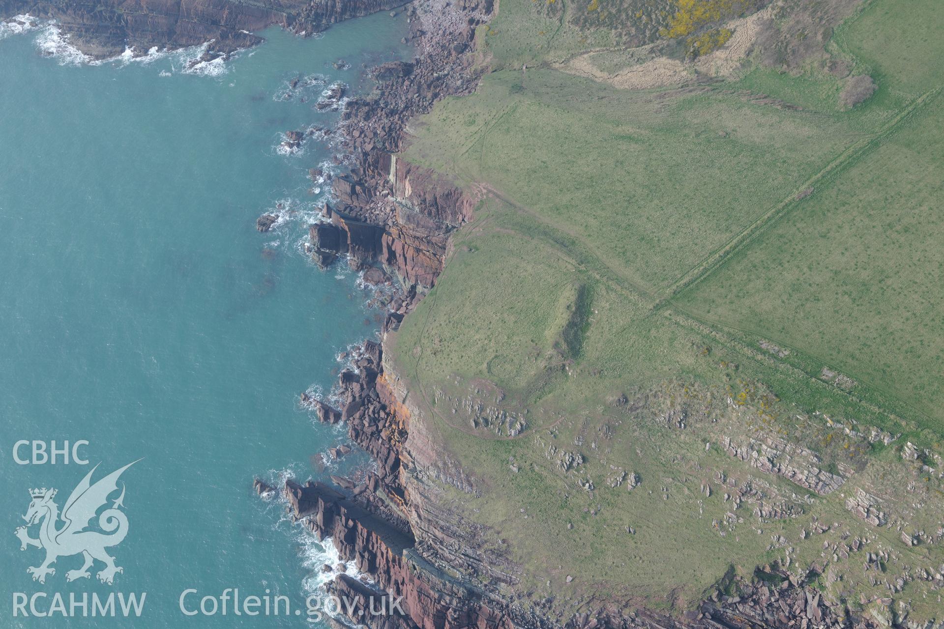 Aerial photography of West Pickard Bay promontory fort taken on 27th March 2017. Baseline aerial reconnaissance survey for the CHERISH Project. ? Crown: CHERISH PROJECT 2019. Produced with EU funds through the Ireland Wales Co-operation Programme 2014-2020. All material made freely available through the Open Government Licence.