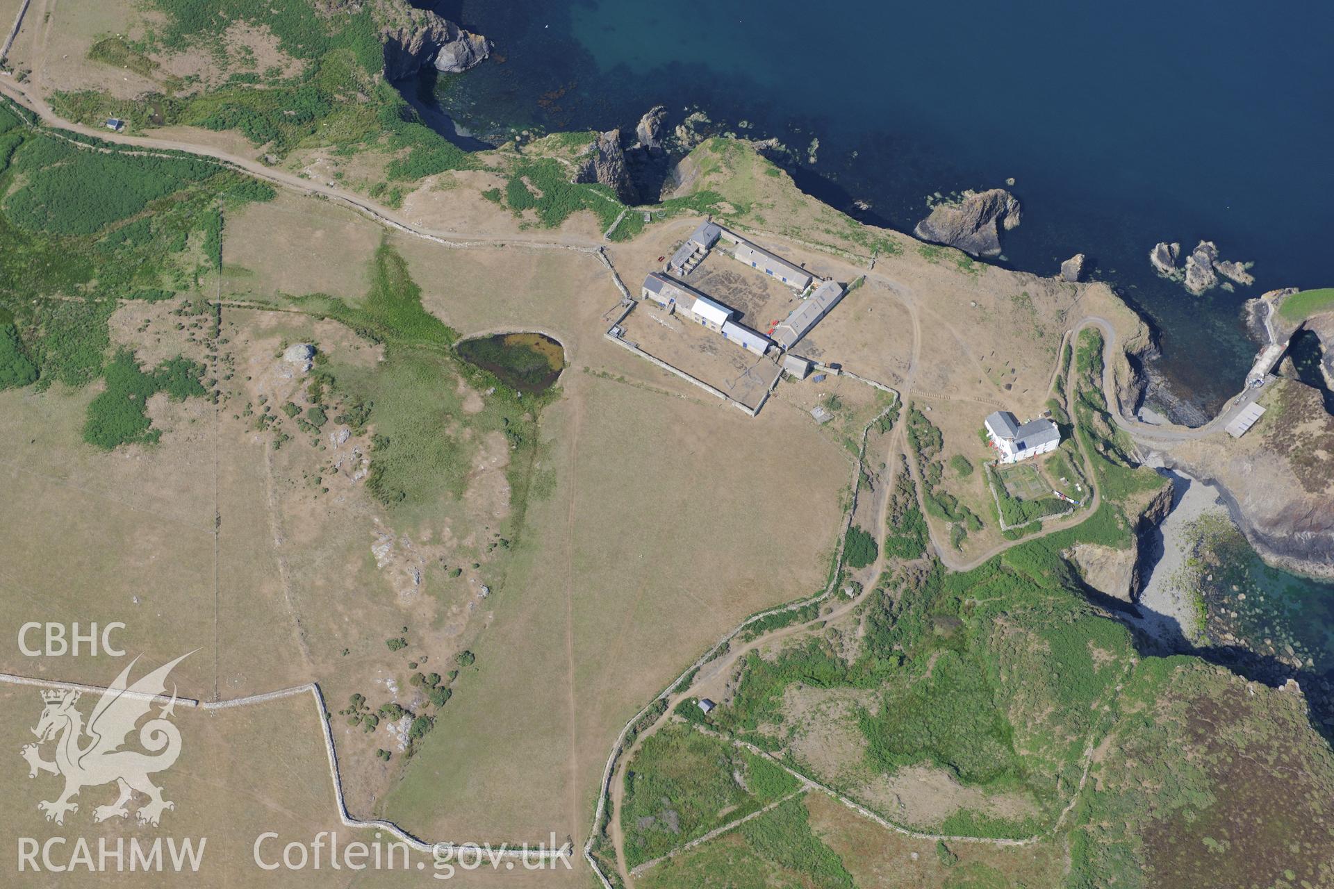 Ramsey Island Farm on Ramsey Island. Oblique aerial photograph taken during the Royal Commission?s programme of archaeological aerial reconnaissance by Toby Driver on 16th July 2013.