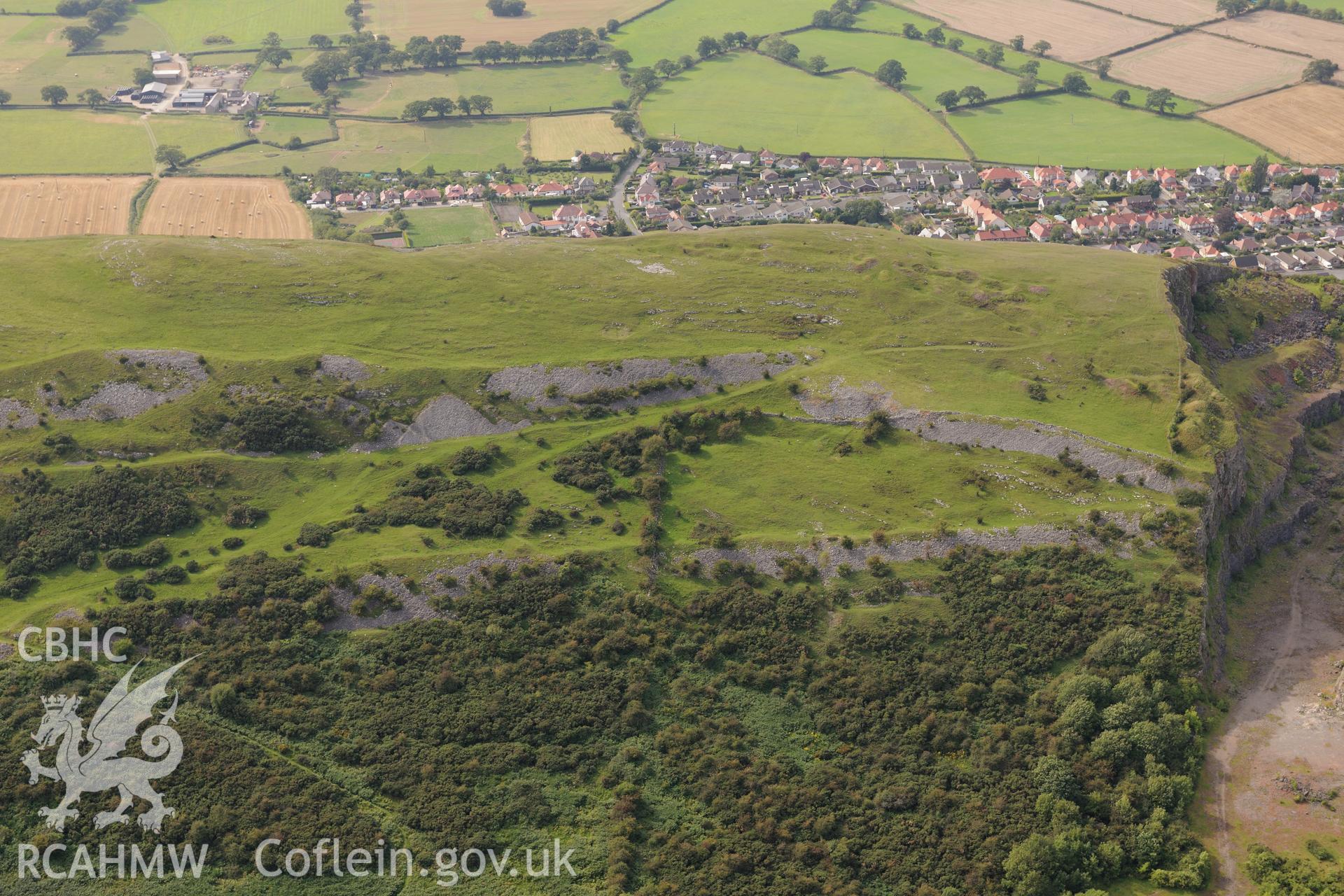 Moel Hiraddug Camp, Dyserth, near St. Asaph. Oblique aerial photograph taken during the Royal Commission's programme of archaeological aerial reconnaissance by Toby Driver on 11th September 2015.