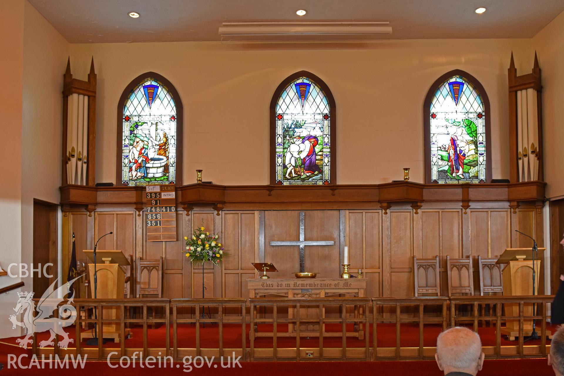 Colour photograph showing interior view looking towards the communion table at the English Wesleyan Methodist Chapel, Porthcawl, taken during photographic survey conducted by Sue Fielding on 12th May 2018.