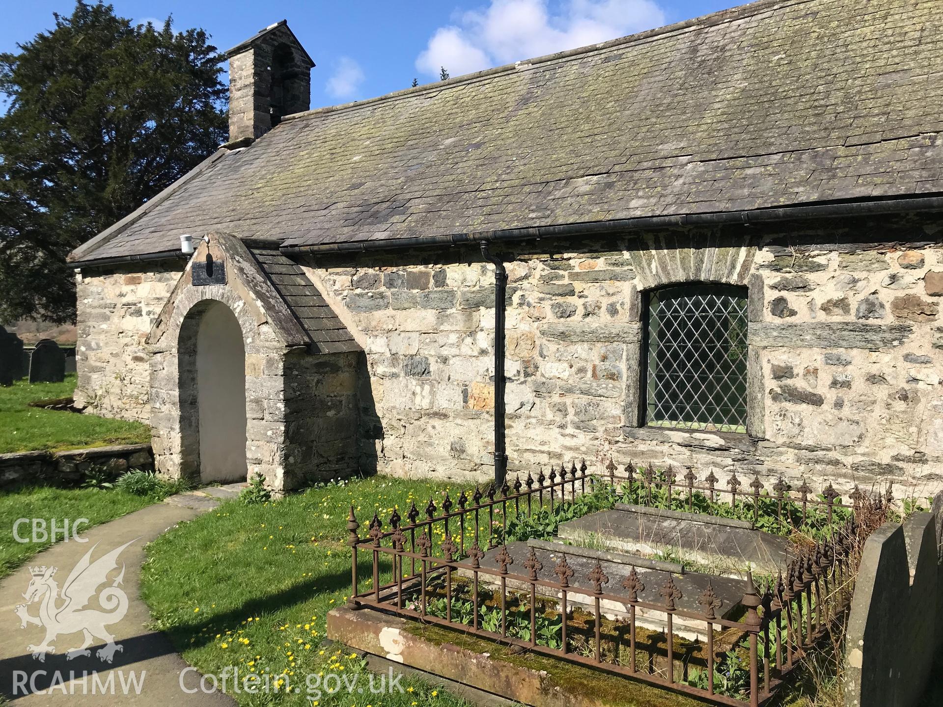 Colour photograph showing exterior view of Eglwys Mihangel (St. Michael's Church) including entrance porch, Llanfihangel-y-Pennant, taken by Paul R. Davis on 28th March 2019.