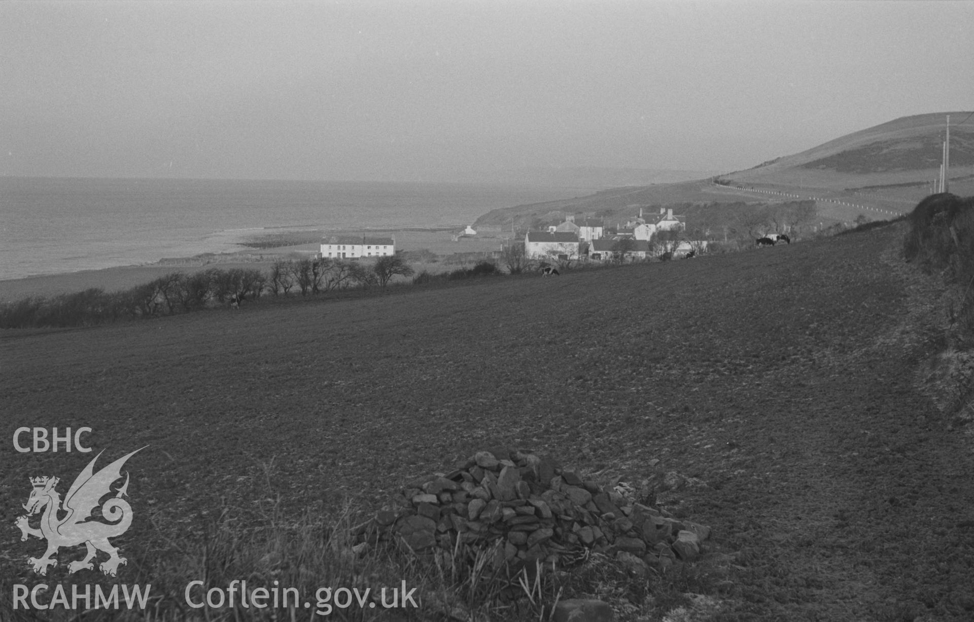 Black and White photograph showing Aberarth village from the main road to the south west. Photographed by Arthur Chater in December 1962, from Grid Reference SN 475 634, looking north east.