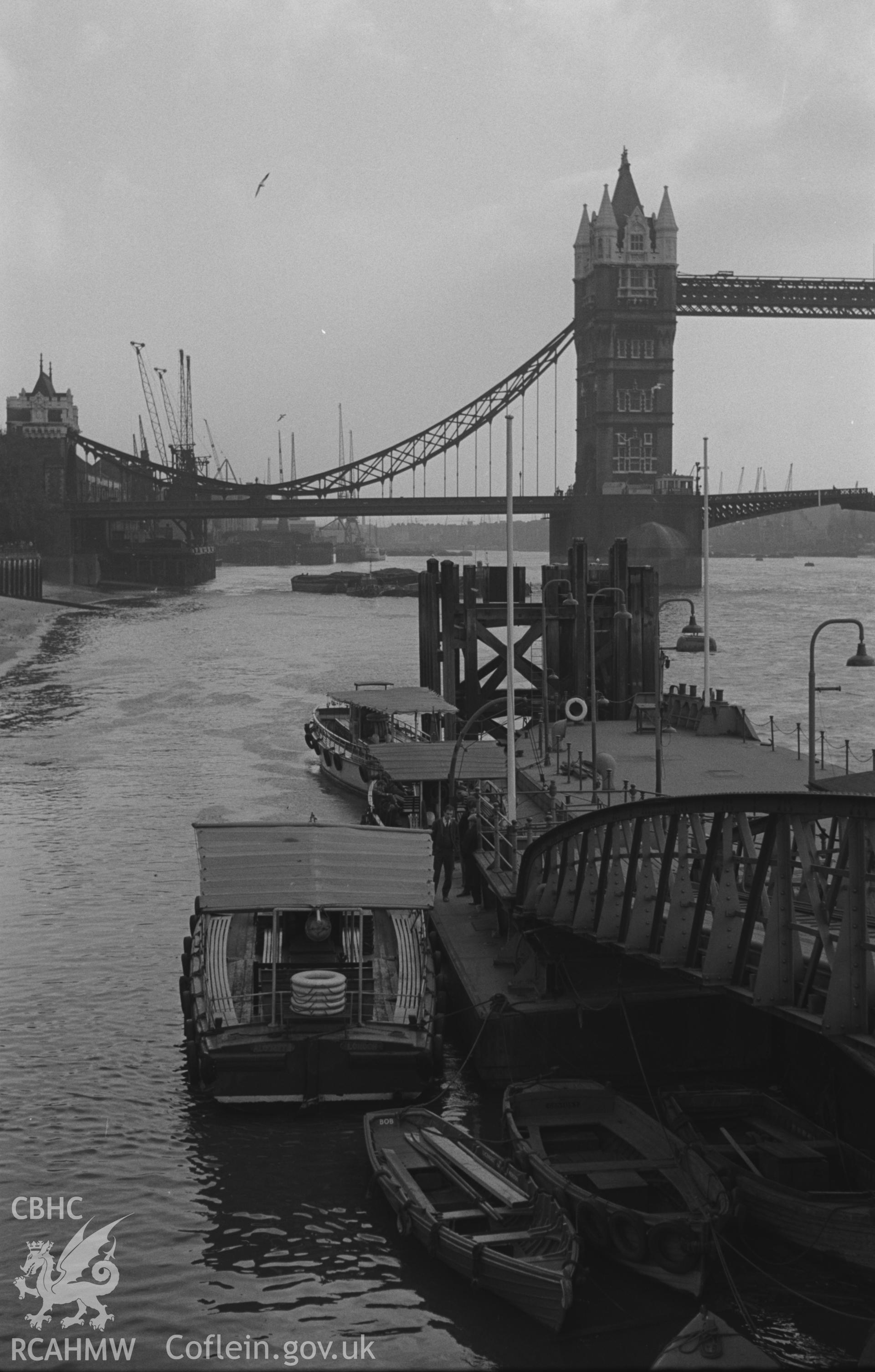 Black and White photograph showing buildings on the Thames, London.