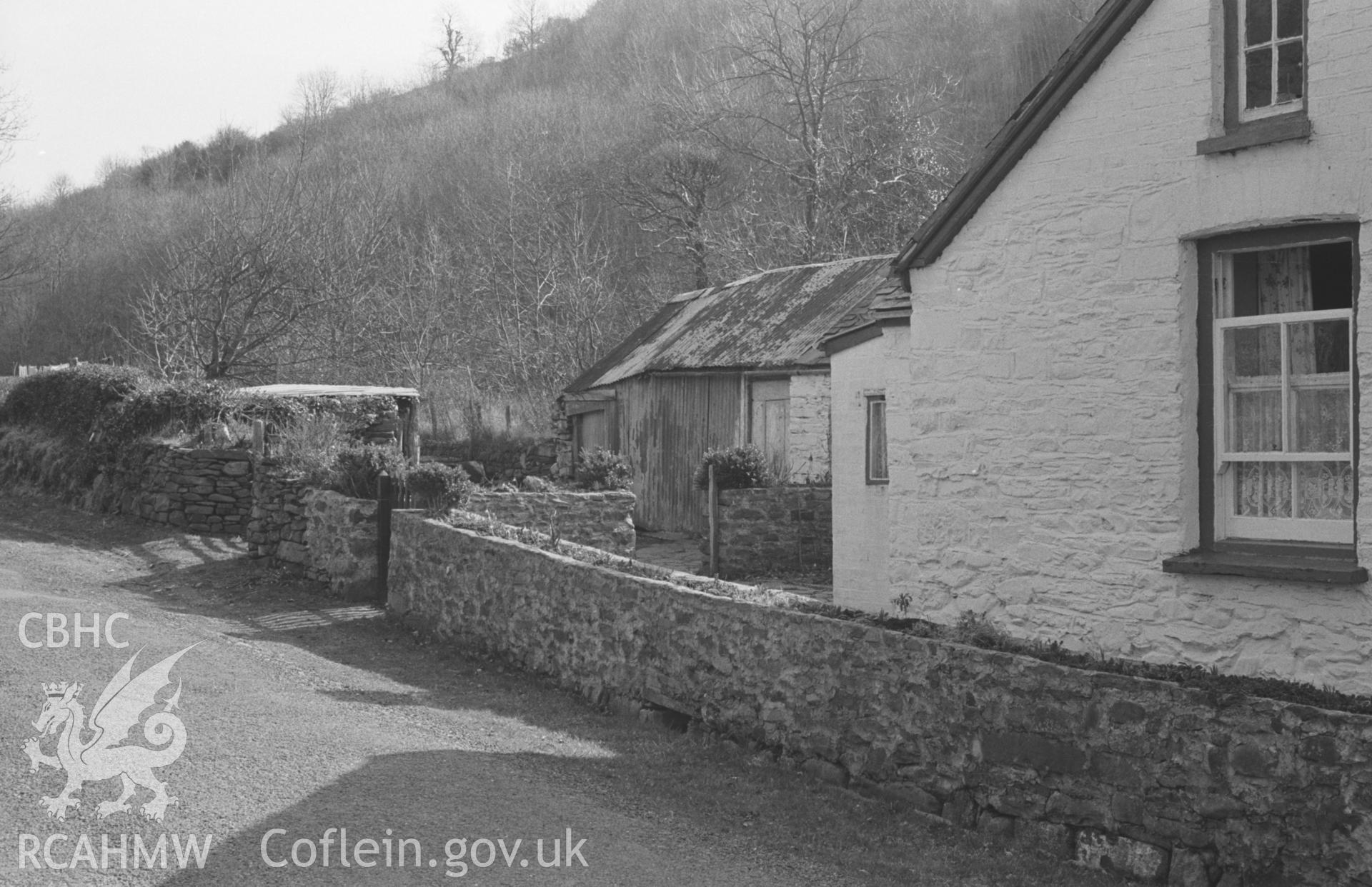 Black and White photograph showing the south western end of cottage at Dol Boeth near Llanrhystyd. Photographed by Arthur Chater in April 1963 from Grid Reference SN 549 691, looking south.