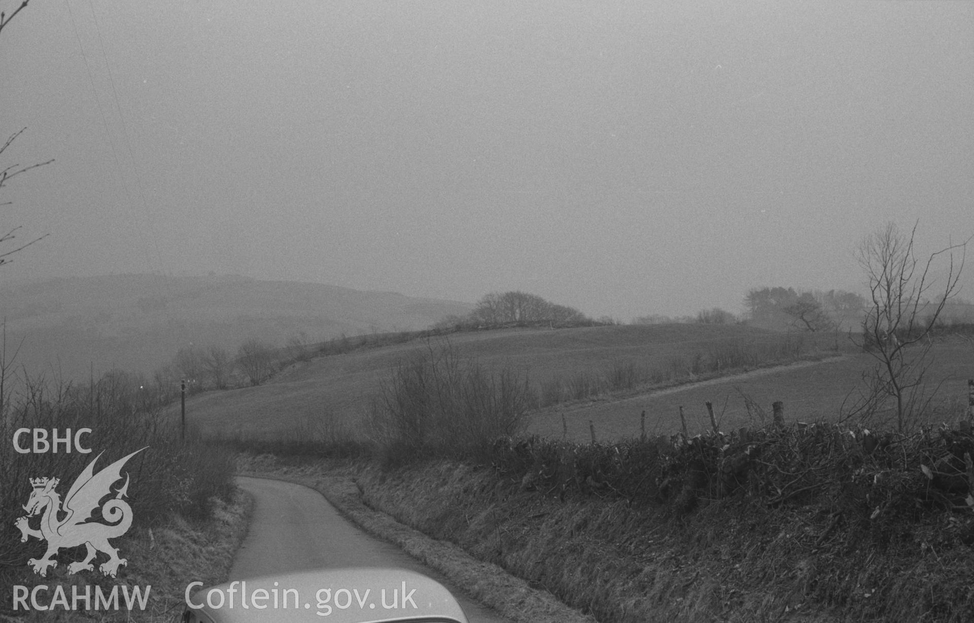 Black and White photograph showing lane and landscape near Llawr-y-Glyn.