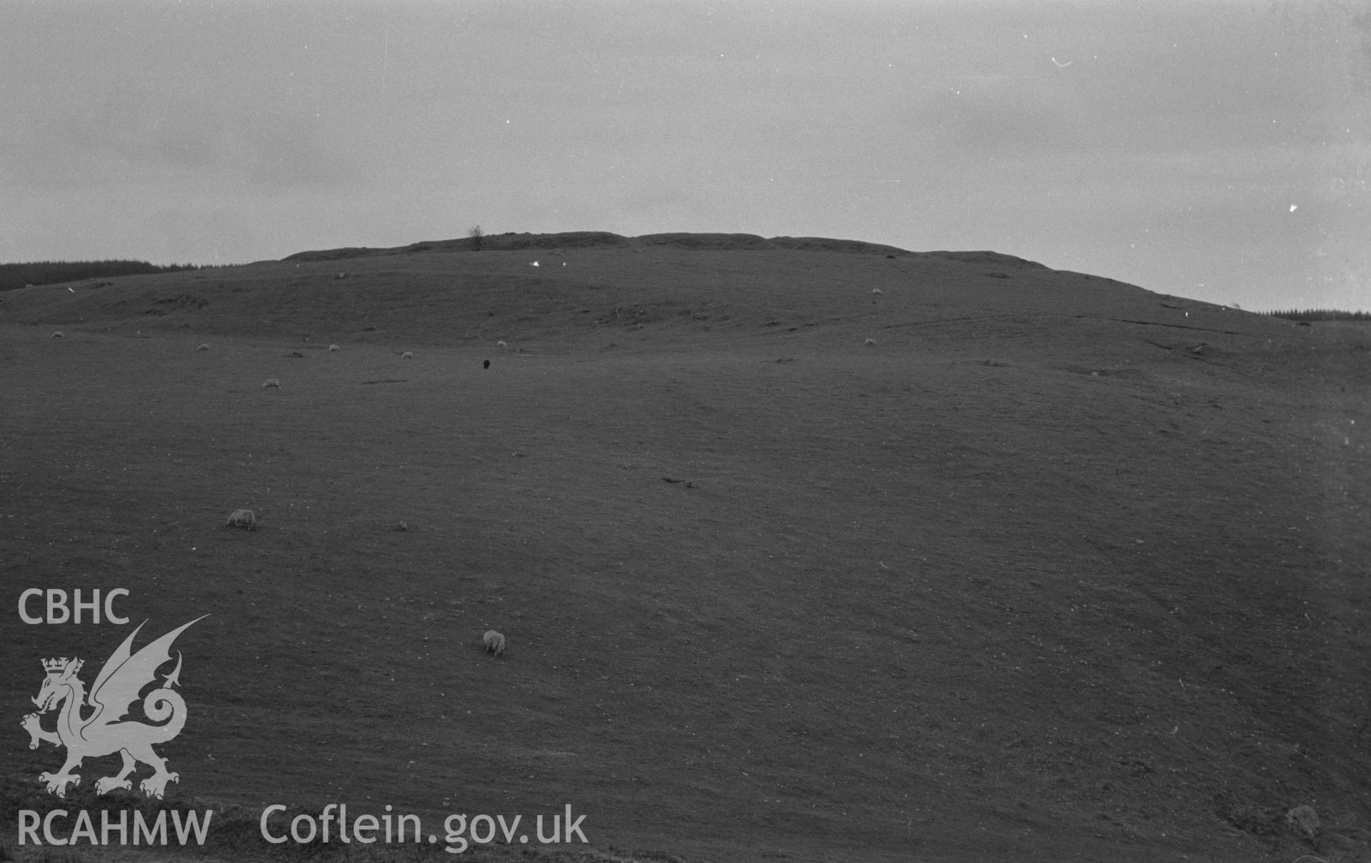 Black and white print of Pen y Castell iron-age camp 1.5km south south east of Elerch at 750ft. Photographed by Arthur Chater in December 1961 from Grid Reference SN 689 850, looking south.