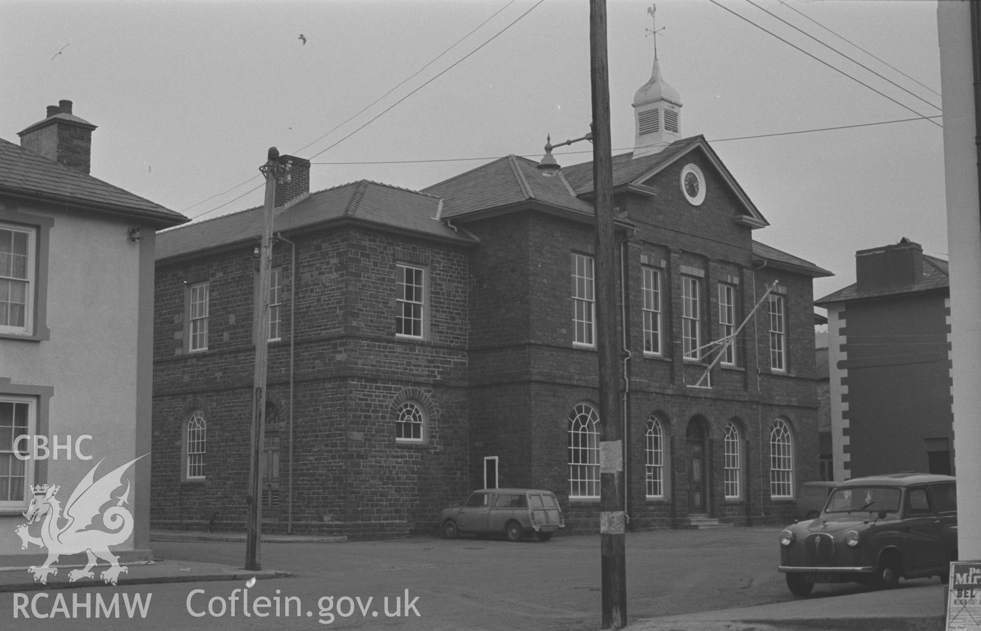 Black and White photograph showing Town Hall, Market Street, Aberaeron. Photographed by Arthur Chater, February 1963. Taken from grid reference: SN 4577 6292, looking east.