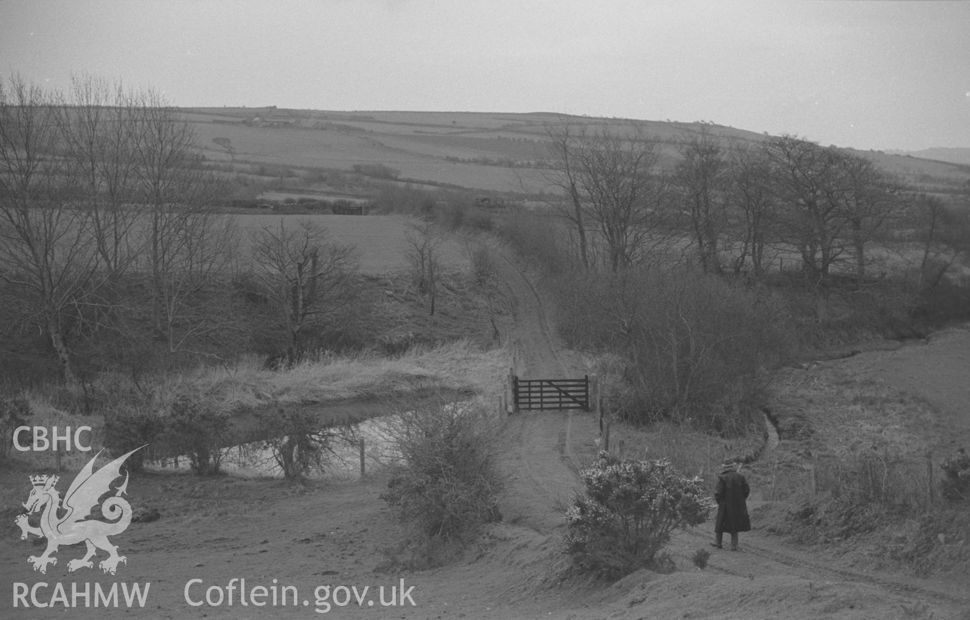 Black and White photograph showing small artificial pool at side of stream 400m east of Dolau, on lane to old mill. Photographed by Arthur Chater in April 1962 from Grid Reference SN 639 863, looking south.