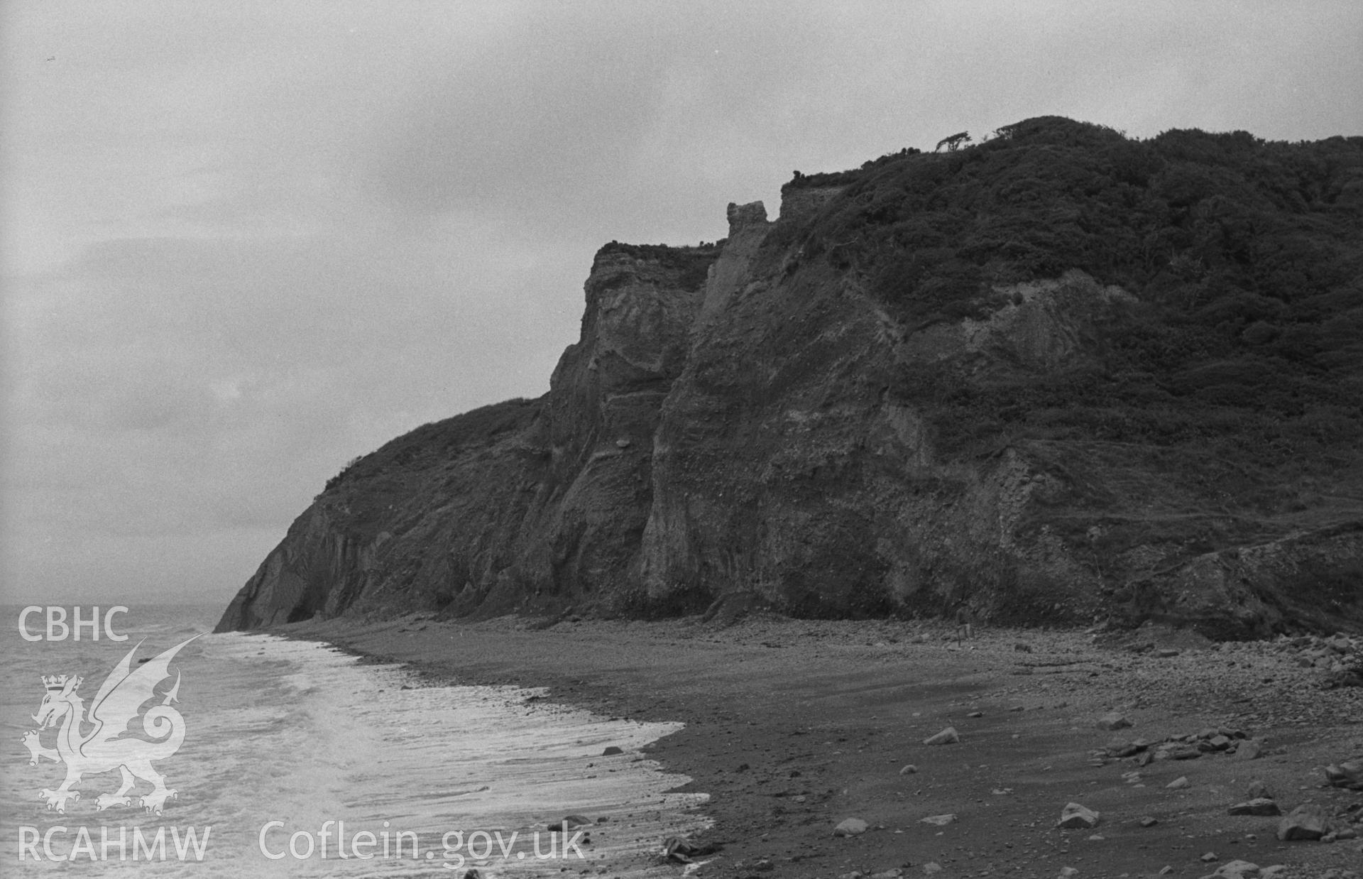 Black and White photograph showing view of the boulder clay cliffs from the mouth of the Afon Gwinton, Gilfach yr Halen beach. Photographed by Arthur Chater in August 1962 from Grid Reference SN 435 614, looking north east.
