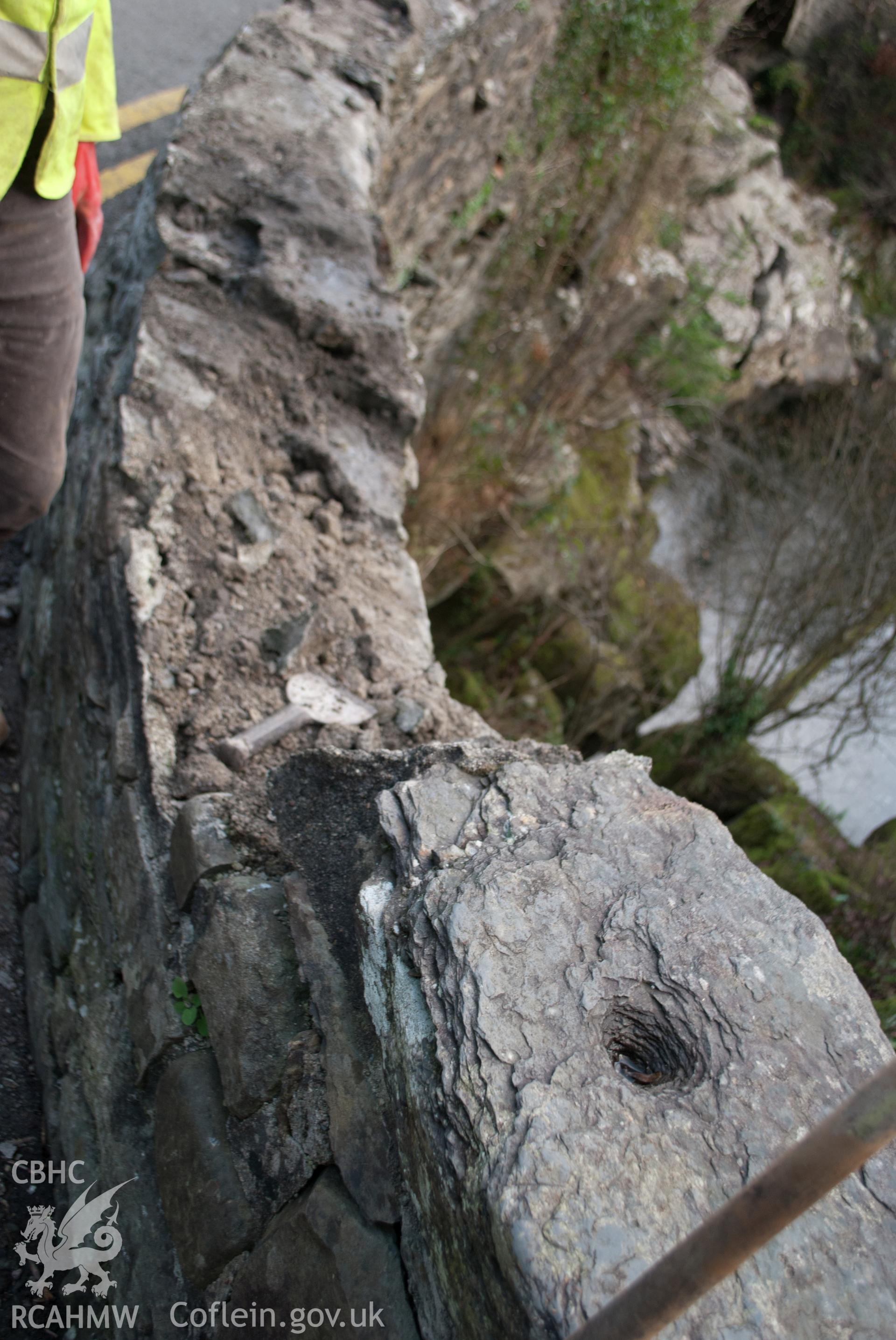 Detail of mortar within parapet core viewed from the south west. Digital photograph taken for Archaeological Watching Brief at Pont y Pair, Betws y Coed, 2019. Gwynedd Archaeological Trust Project no. G2587.