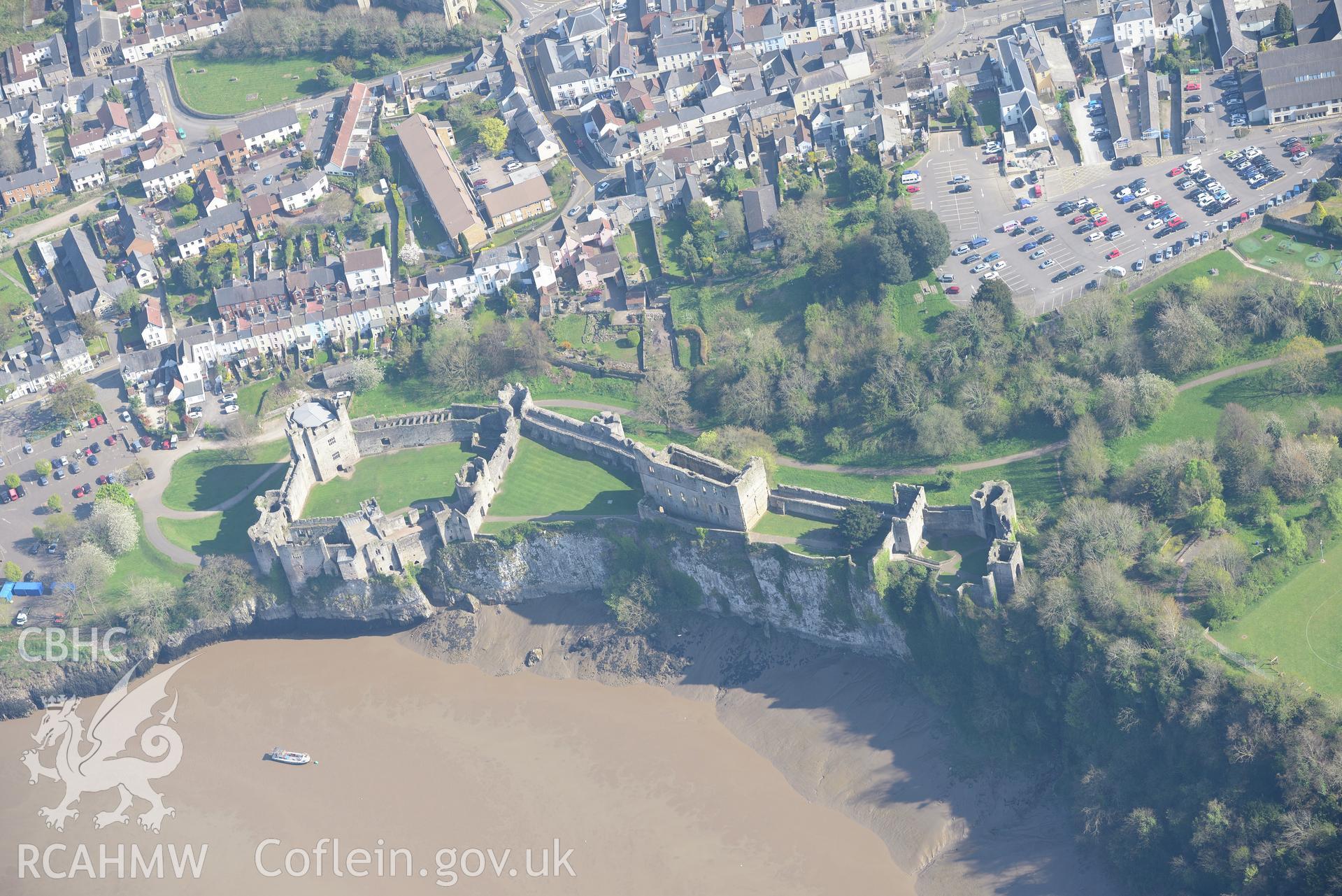 Chepstow including views of the Castle and St. Mary's Church. Oblique aerial photograph taken during the Royal Commission's programme of archaeological aerial reconnaissance by Toby Driver on 21st April 2015.