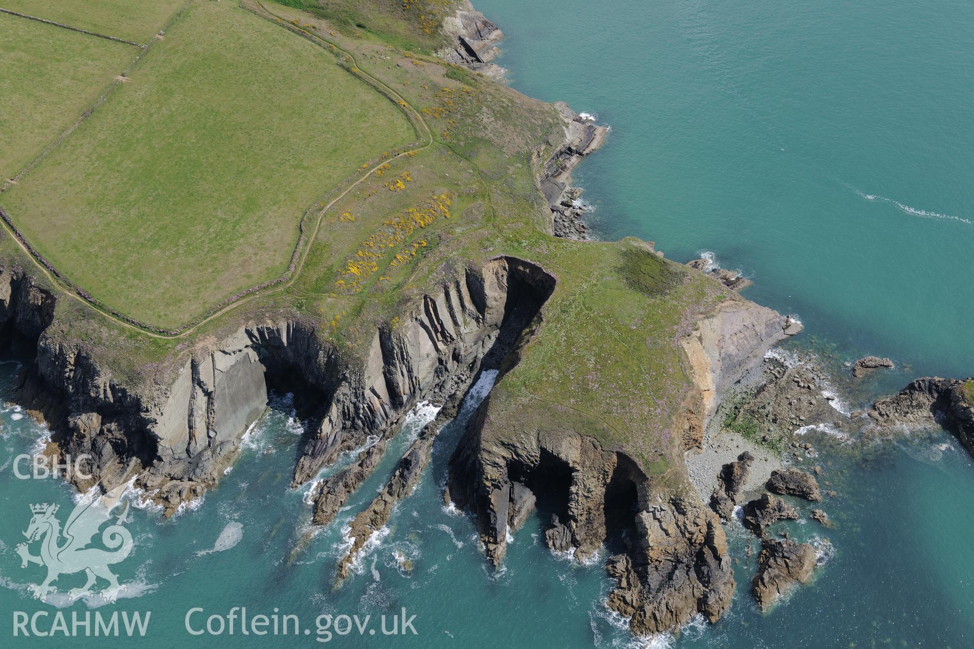 Caerfai promontory fort, near St. Davids. Oblique aerial photograph taken during the Royal Commission's programme of archaeological aerial reconnaissance by Toby Driver on 13th May 2018.