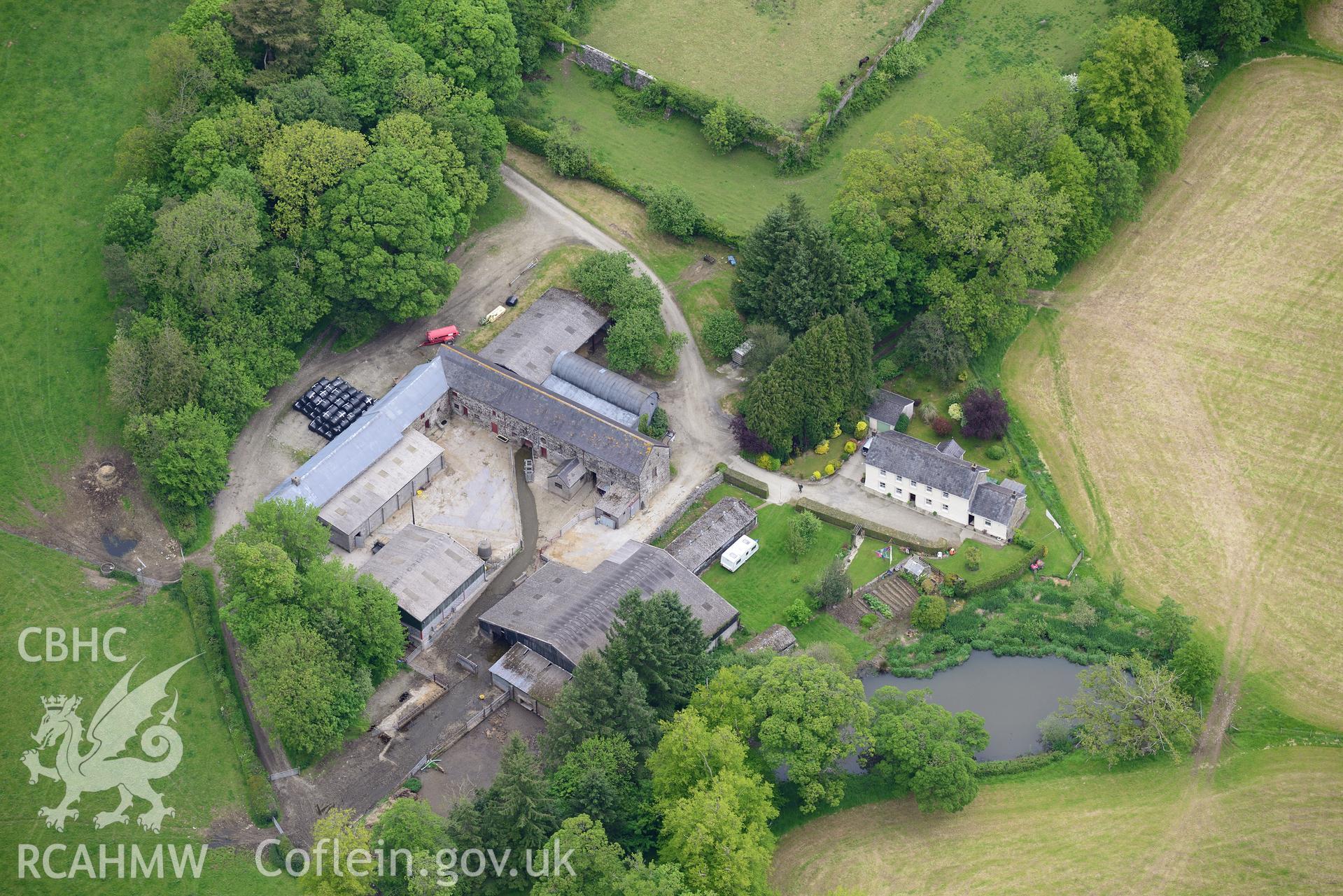 Highmead house and garden and Hendy farm, Llanybydder. Oblique aerial photograph taken during the Royal Commission's programme of archaeological aerial reconnaissance by Toby Driver on 3rd June 2015.