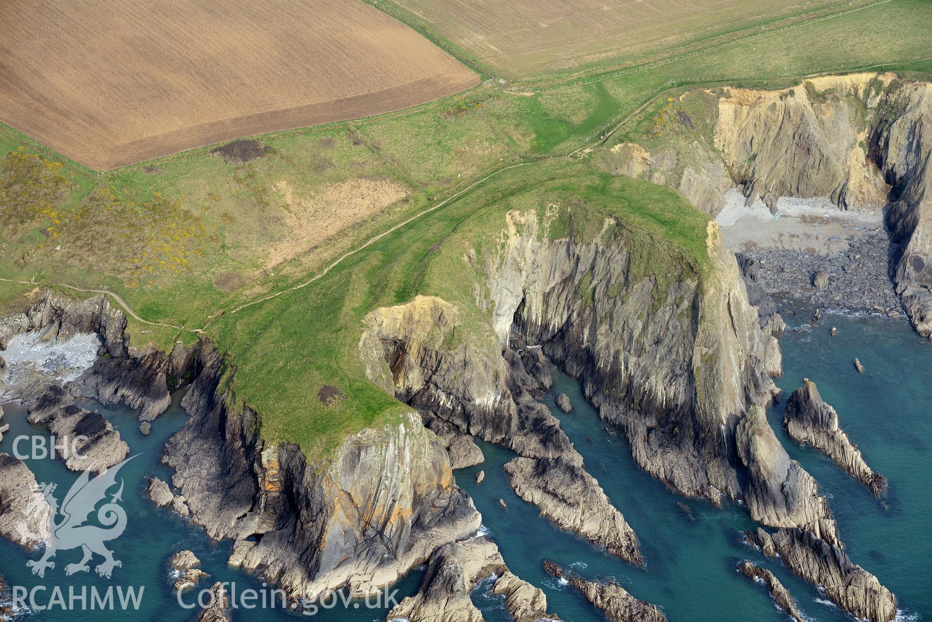 Aerial photography of Porth y Rhaw promontory fort taken on 27th March 2017 for structure from motion recording. Baseline aerial reconnaissance survey for the CHERISH Project. ? Crown: CHERISH PROJECT 2019. Produced with EU funds through the Ireland Wales Co-operation Programme 2014-2020. All material made freely available through the Open Government Licence.