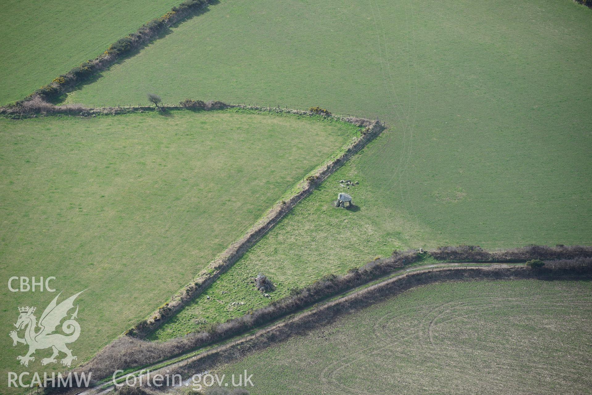Llech-y-Drybedd chambered tomb, near Moylgrove, Cardigan. Oblique aerial photograph taken during the Royal Commission's programme of archaeological aerial reconnaissance by Toby Driver on 13th March 2015.