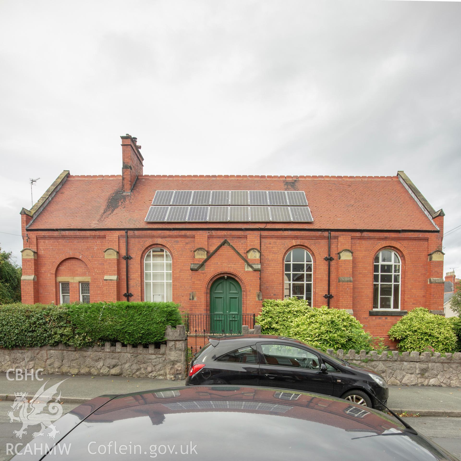 Colour photograph showing side elevation and entrance of Friends' Meeting House, Erskine Road, Colwyn Bay. Photographed by Richard Barrett on 17th September 2018.