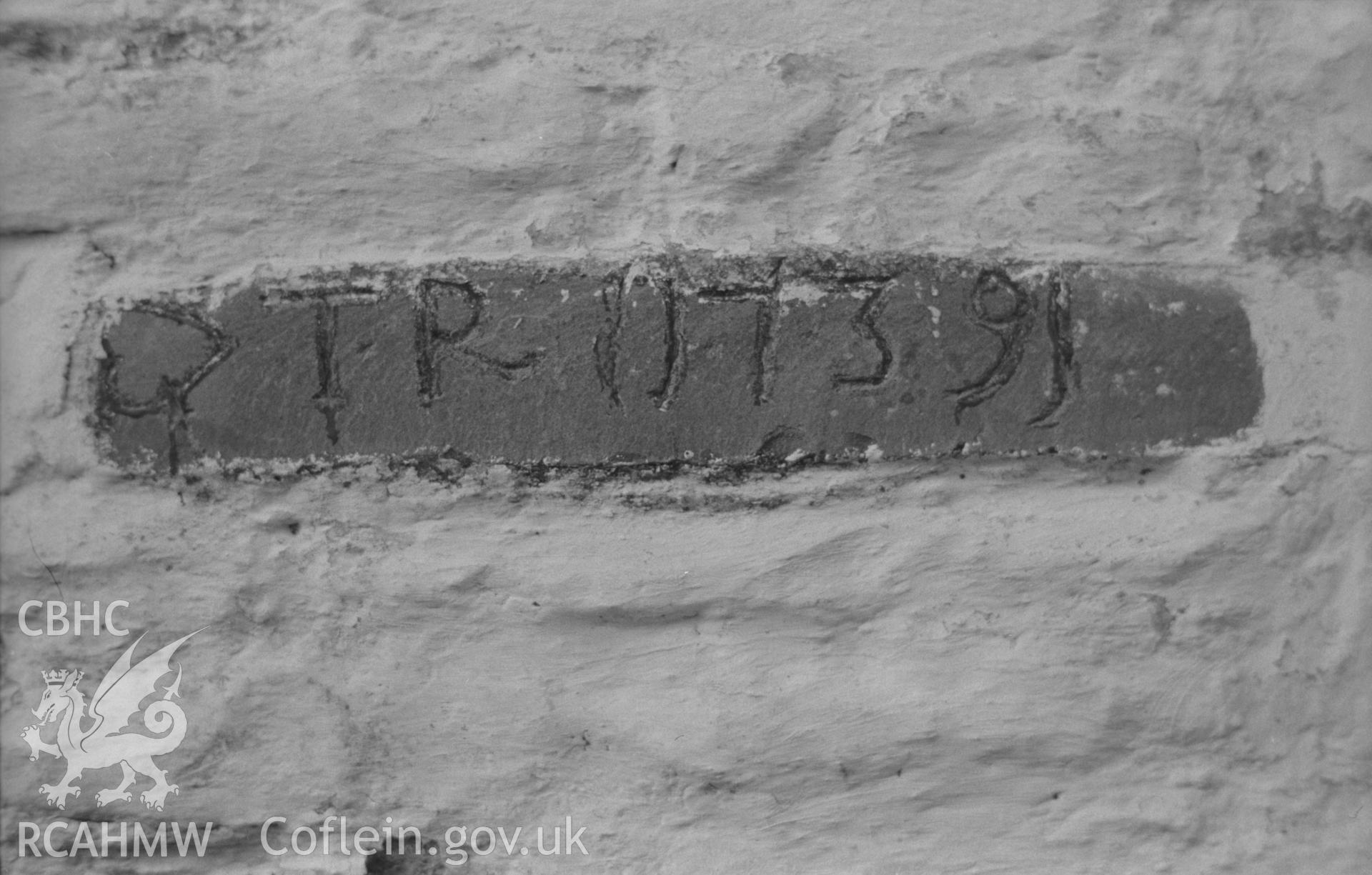 Digital copy of a black and white negative showing inscribed date stone (1739) in wall of outhouse at Lletty-Meurig, Tregaron, on the road to Cwm Berwyn. Photographed by Arthur O. Chater in 2nd September 1966 from Grid Reference SN 693 593.