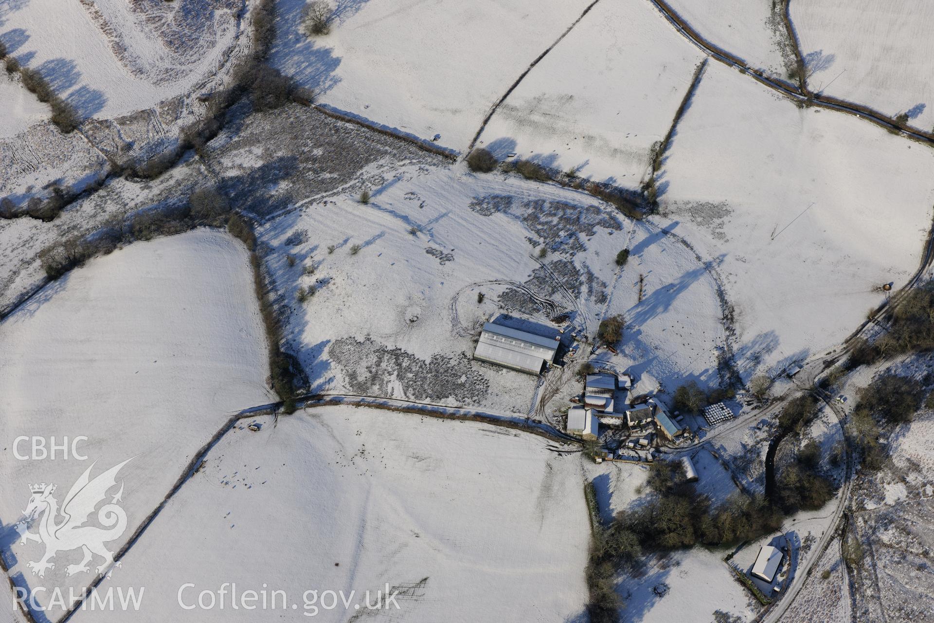 Bryn Twpa farmstead, north east of Builth Wells. Oblique aerial photograph taken during the Royal Commission?s programme of archaeological aerial reconnaissance by Toby Driver on 15th January 2013.
