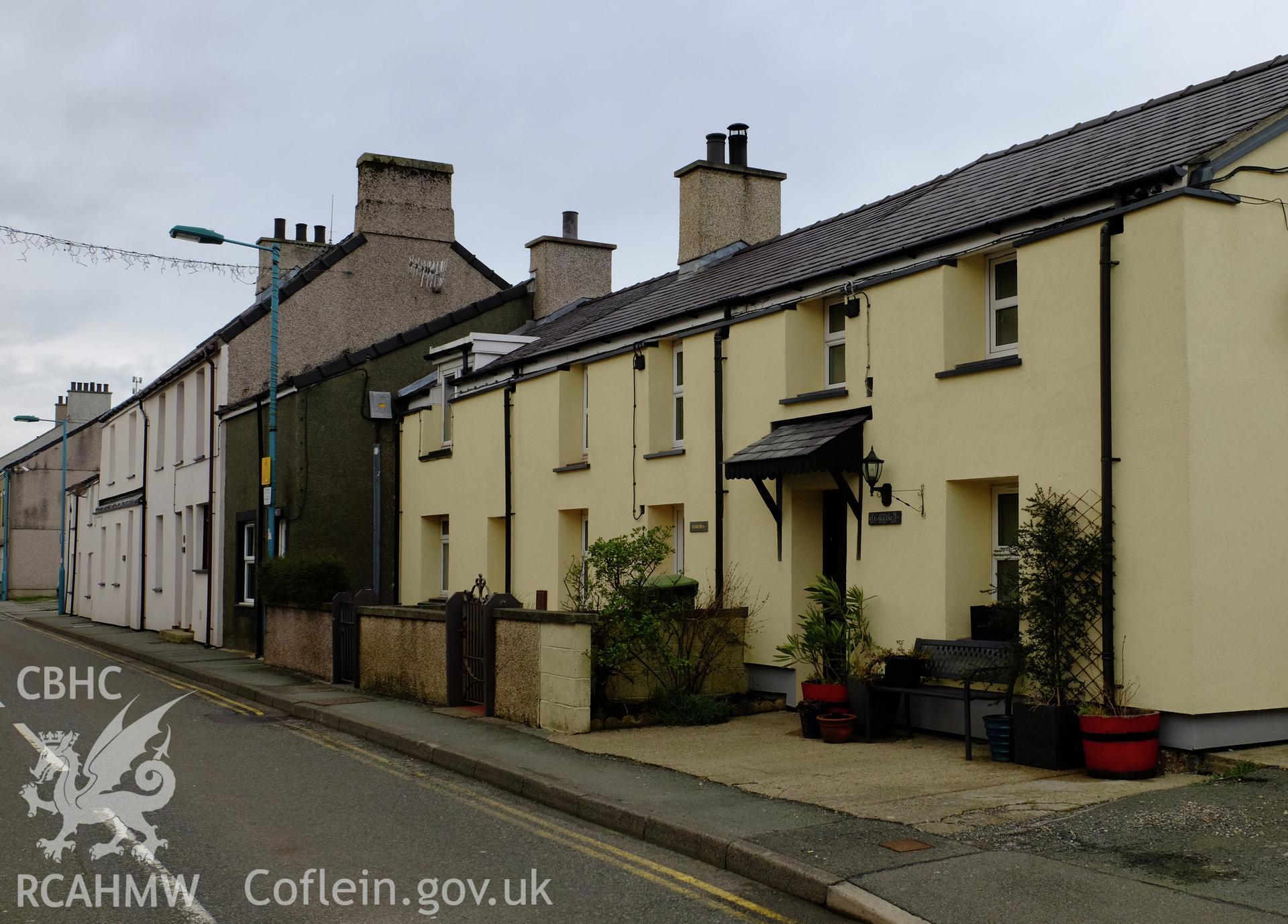 Colour photograph showing view looking west at Stryd Fawr (north side), Deiniolen, produced by Richard Hayman 2nd March 2017