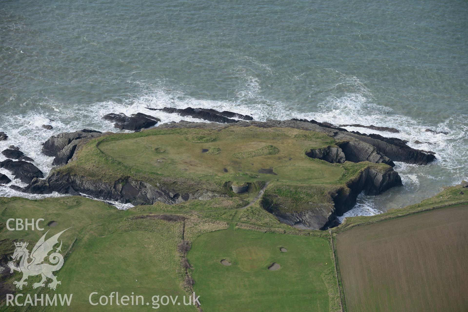 Craig-y-Gwbert and the site of former Craig-y-Gwbert lime kiln, Gwbert, near Cardigan. Oblique aerial photograph taken during the Royal Commission's programme of archaeological aerial reconnaissance by Toby Driver on 13th March 2015.