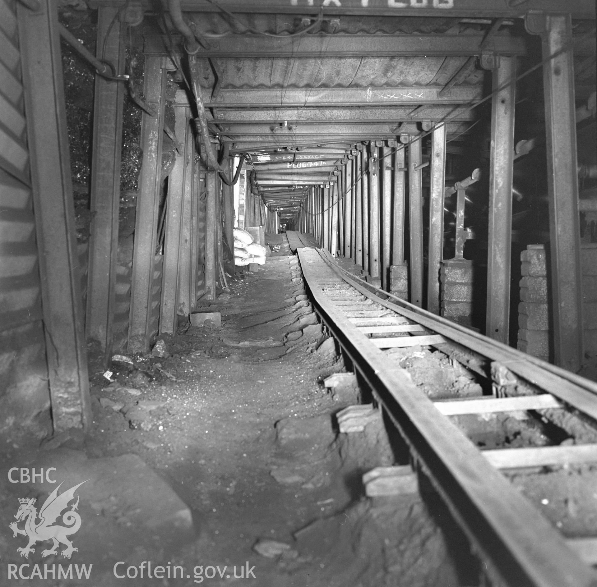 Digital copy of an acetate negative showing "square work in heading leading to above coal face" at Taff Colliery from the John Cornwell Collection.