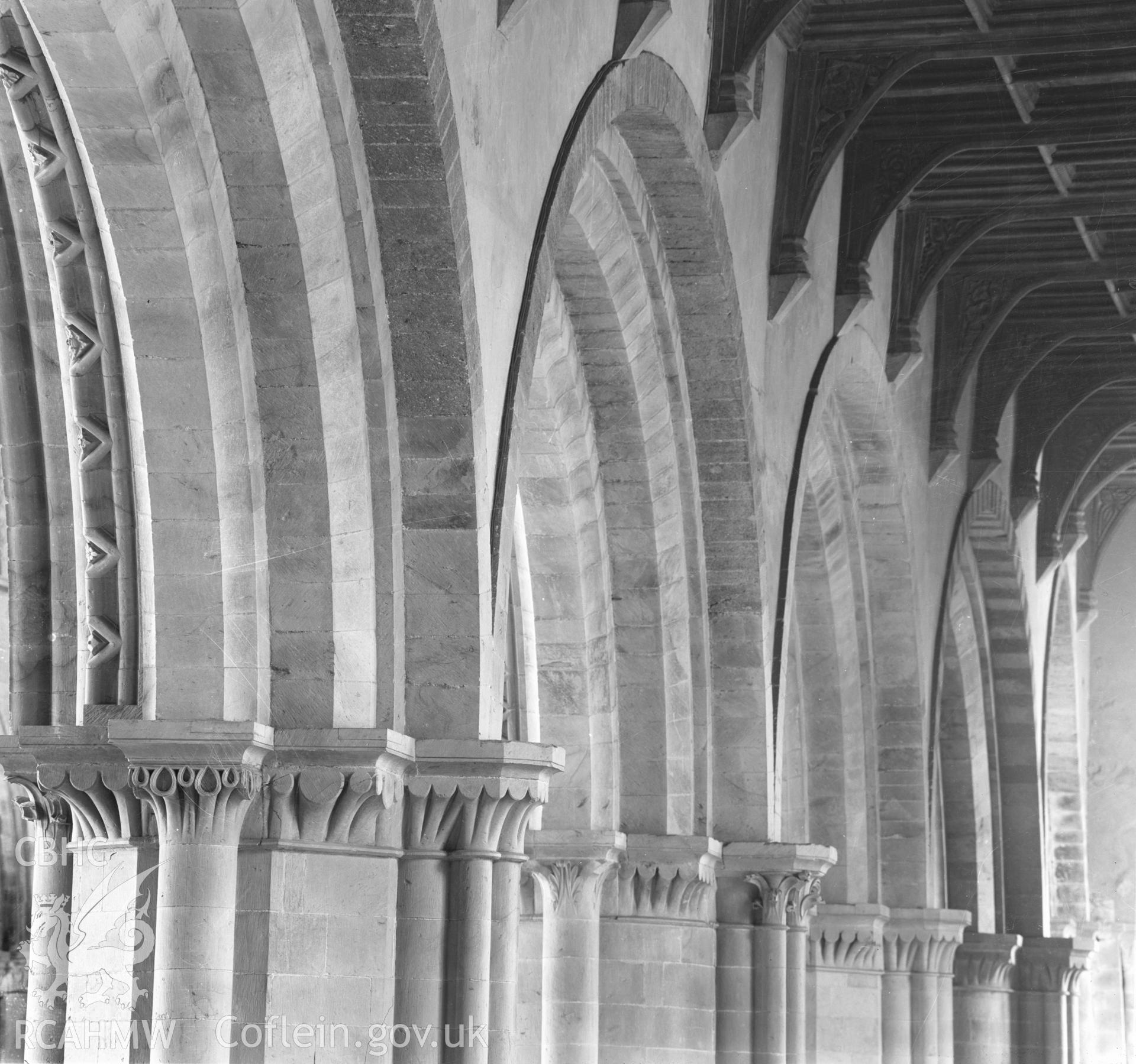 Digital copy of a black and white acetate negative showing clustered columns in St. David's Cathedral, taken by E.W. Lovegrove, July 1936.