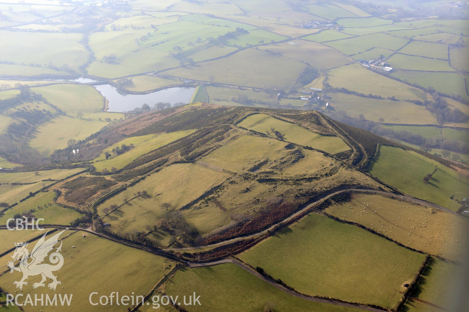 Mynydd-y-Gaer hillfort, Llannefydd, north west of Denbigh. Oblique aerial photograph taken during the Royal Commission?s programme of archaeological aerial reconnaissance by Toby Driver on 28th February 2013.