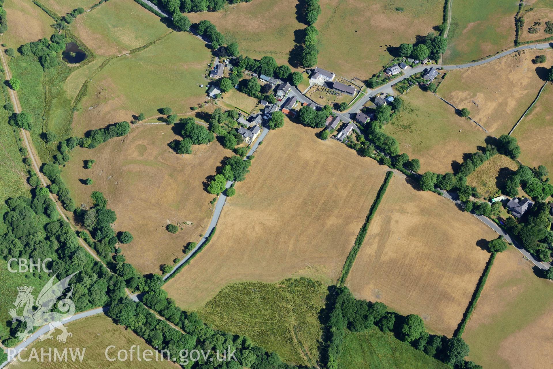 Royal Commission aerial photography of Ystradmeurig village taken on 19th July 2018 during the 2018 drought.