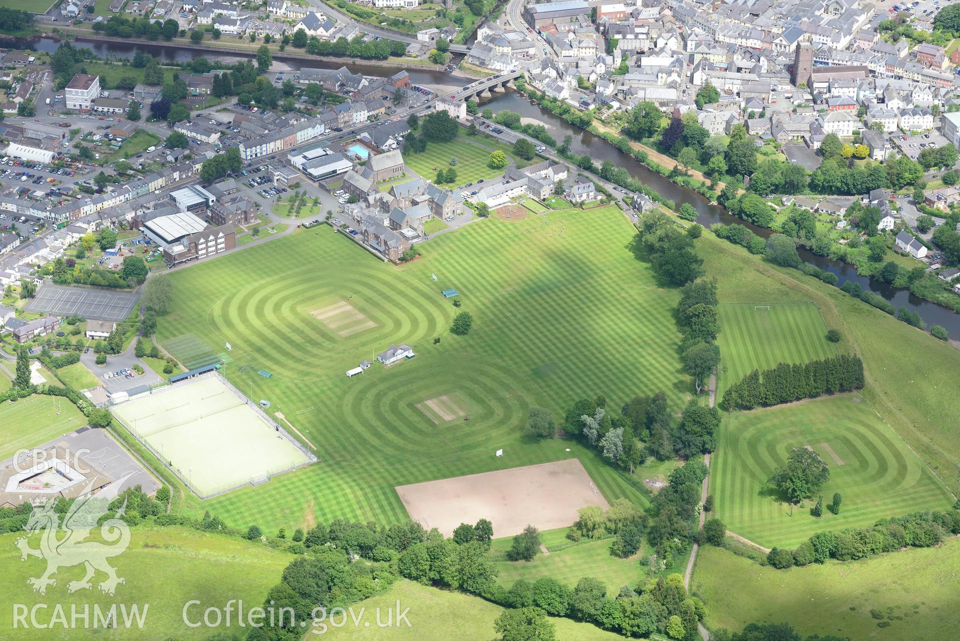 Christ College and the playing fields attached. Oblique aerial photograph taken during the Royal Commission's programme of archaeological aerial reconnaissance by Toby Driver on 29th June 2015.