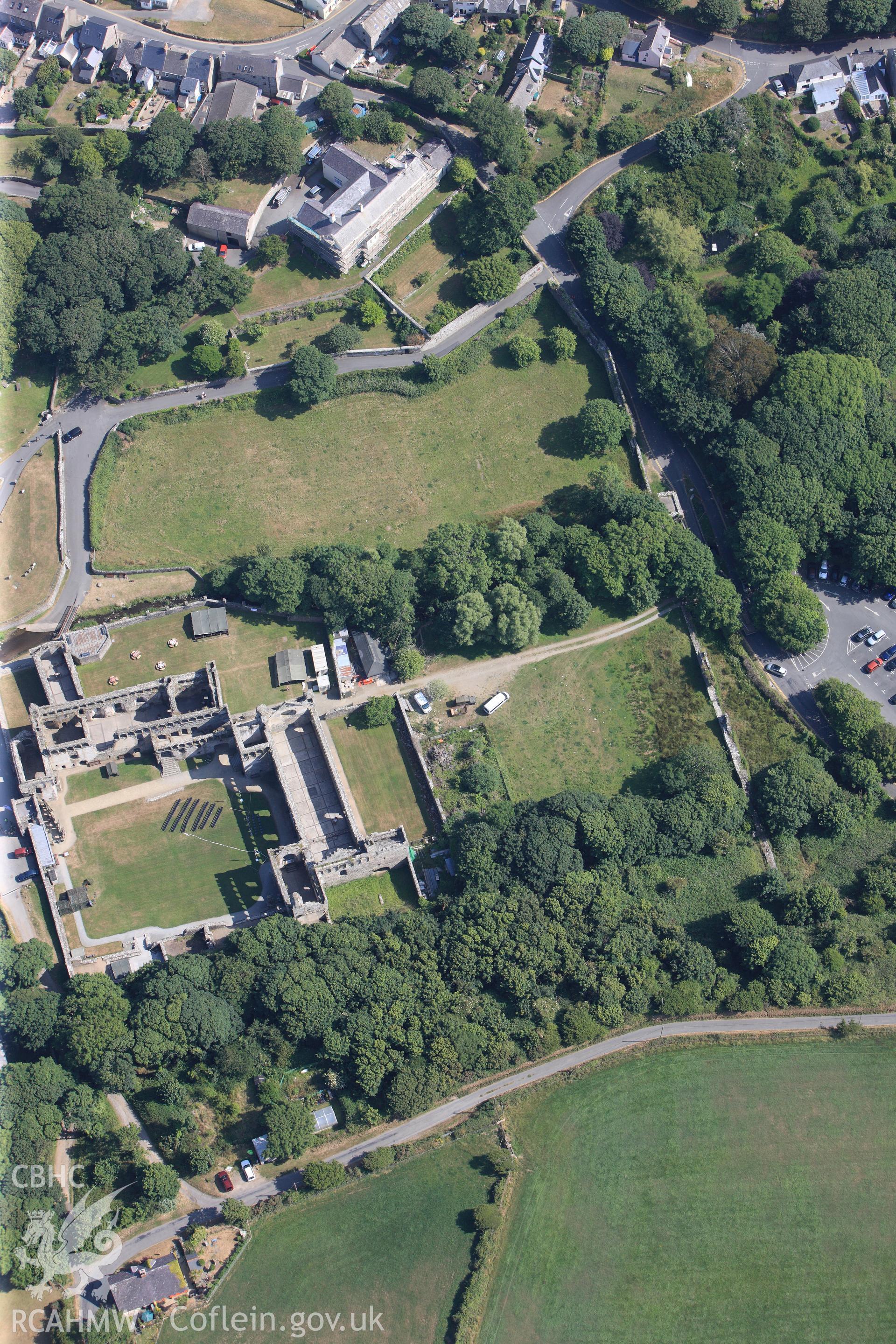 St Davids Cathedral and St Davids Bishops Palace. Oblique aerial photograph taken during the Royal Commission?s programme of archaeological aerial reconnaissance by Toby Driver on 16th July 2013.