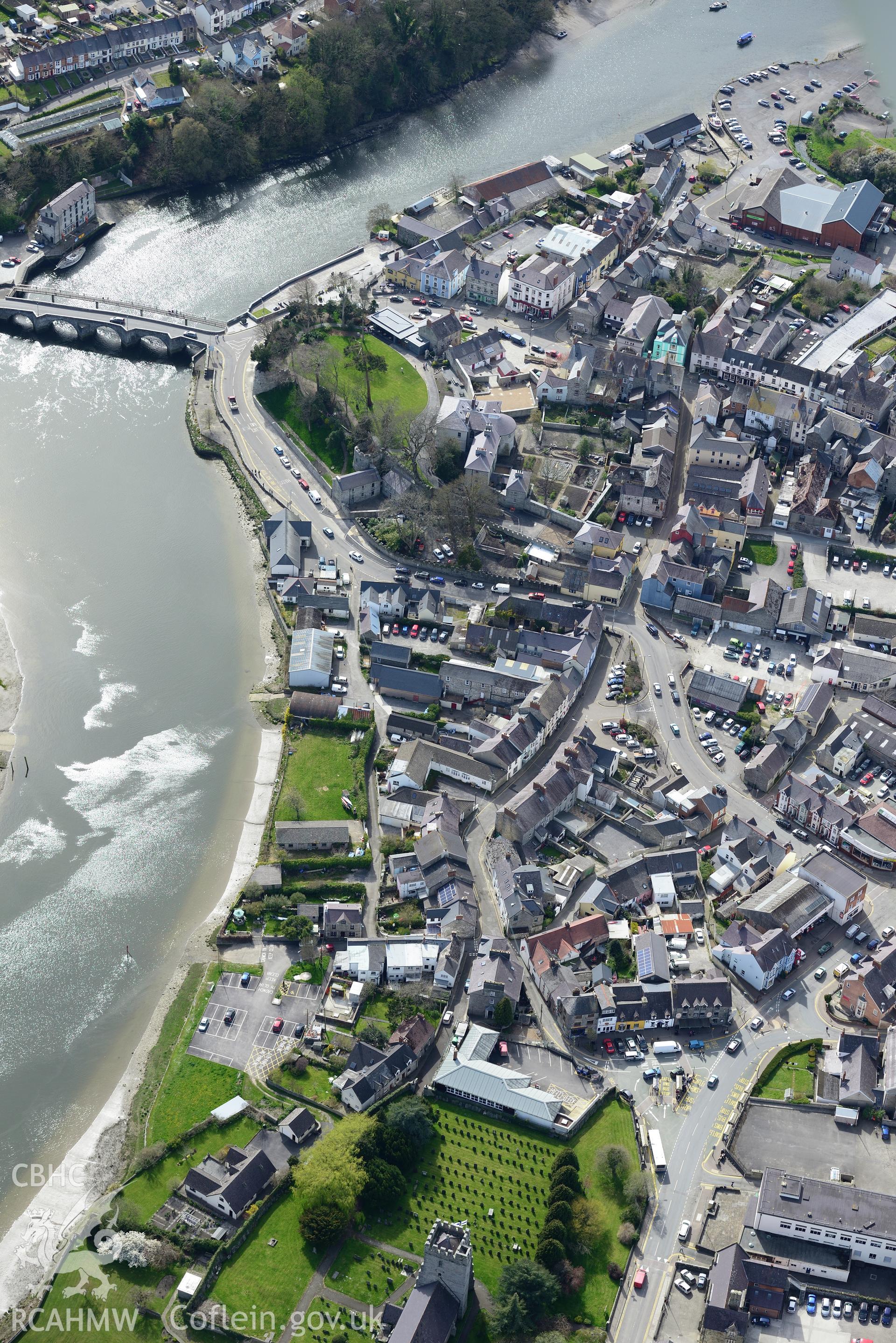 Cardigan Town, Castle, Bridge, Harbour and St Mary's Church and Priory. Oblique aerial photograph taken during the Royal Commission's programme of archaeological aerial reconnaissance by Toby Driver 15th April 2015.