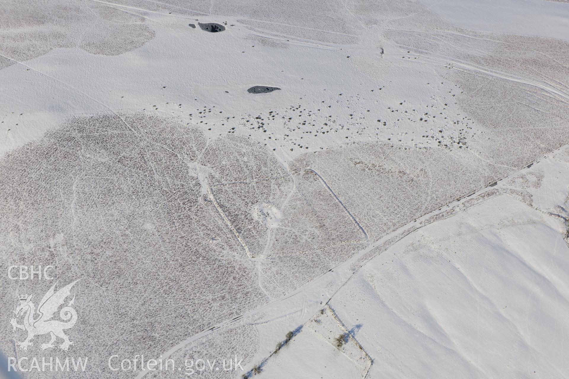 Cwm Blaen Erw enclosure 1 and Cwm Blaen Erw enclosed long hut, Glascwm, north east of Builth Wells. Oblique aerial photograph taken during the Royal Commission?s programme of archaeological aerial reconnaissance by Toby Driver on 15th January 2013.