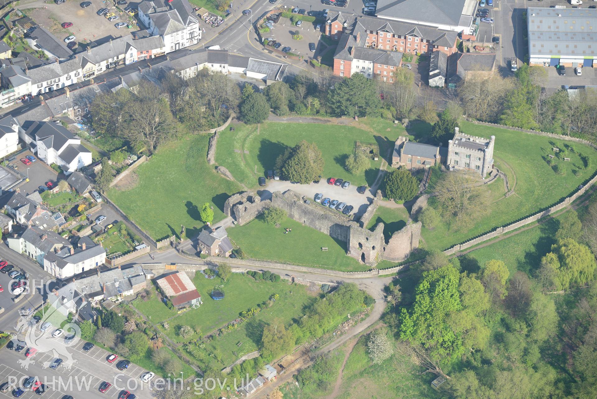Abergavenny including the Castle; Castle Gardens; Castle Museum; Corn Mill; Tannery and Lulworth House. Oblique aerial photograph taken during the Royal Commission's programme of archaeological aerial reconnaissance by Toby Driver on 21st April 2015.