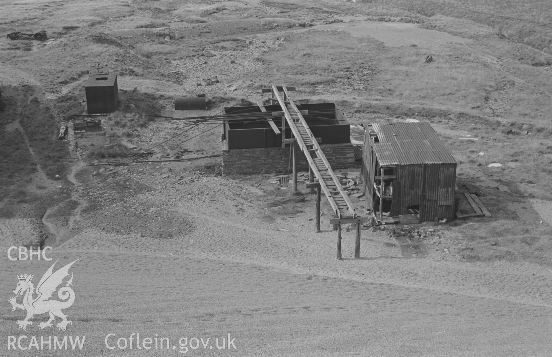 Digital copy of a black and white negative showing works of the Elerith Mining Co. on the lower part of Esgair Mwyn Mine, Ystrad Fflur. Photographed by Arthur O. Chater in August 1966 looking west north west from Grid Reference SN 756 992.
